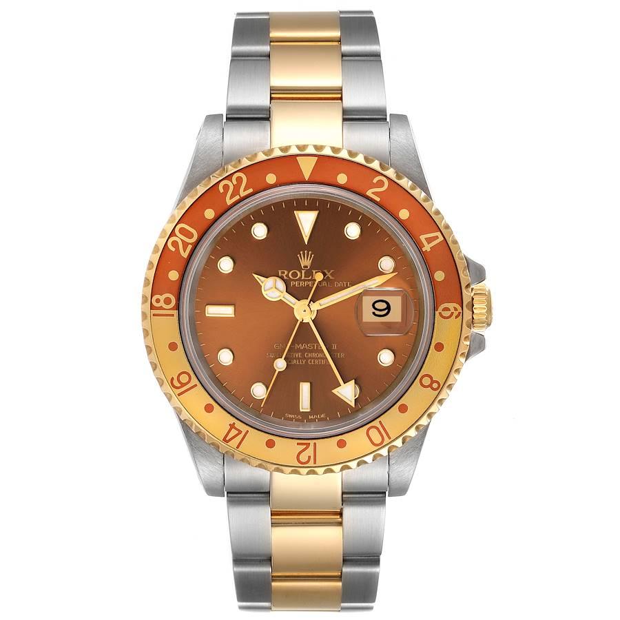 Rolex GMT Master II Root Beer Steel Yellow Gold Mens Watch 16713. Officially certified chronometer automatic self-winding movement. Stainless steel case 40.0 mm in diameter. Rolex logo on the crown. 18k yellow gold bidirectional rotating bezel with