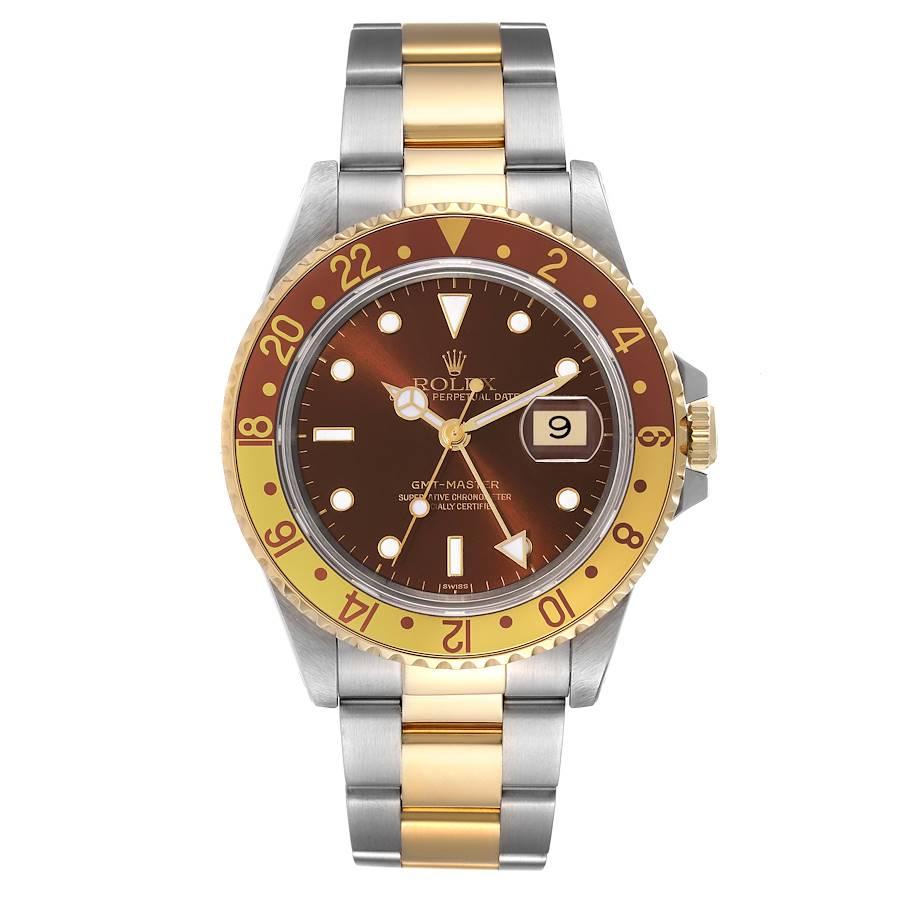 Rolex GMT Master II Root Beer Steel Yellow Gold Mens Watch 16713. Officially certified chronometer automatic self-winding movement. Stainless steel case 40.0 mm in diameter. Rolex logo on the crown. 18k yellow gold bidirectional rotating bezel with