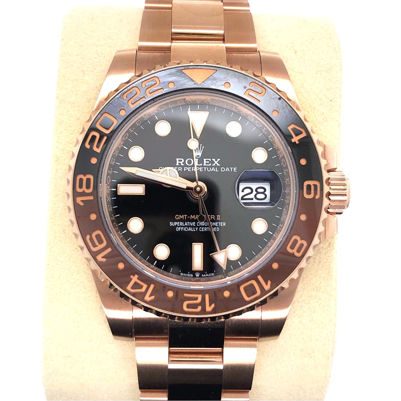 Rolex GMT Master II in 18k rose gold Ref# 126715CHNR. On 18k rose gold Oyster bracelet with flip-lock deployment clasp. 18k rose gold rotating bezel with black and brown ceramic bezel insert with 24hr markings, inner bezel engraved. Sapphire