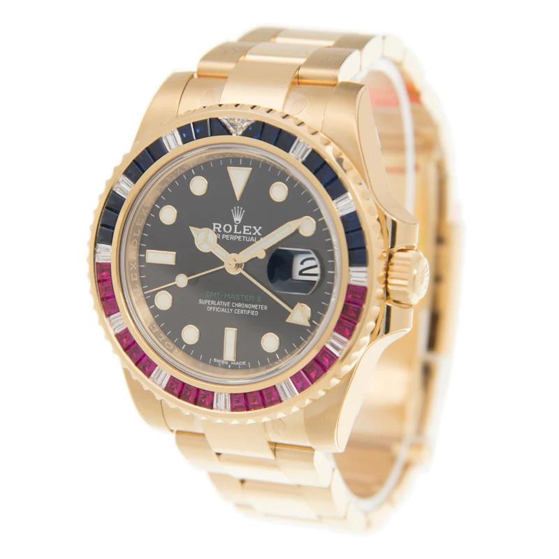 Brand: Rolex

Model Name: GMT - Master II 

Model Number: 116748SARU 

Movement: Mechanical Automatic

Case Size: 40 mm

Case Material: Yellow Gold

Stones: Diamond, Sapphire, Ruby

Dial: Black

Bracelet:  Yellow Gold 

Crystal: Sapphire Crystal