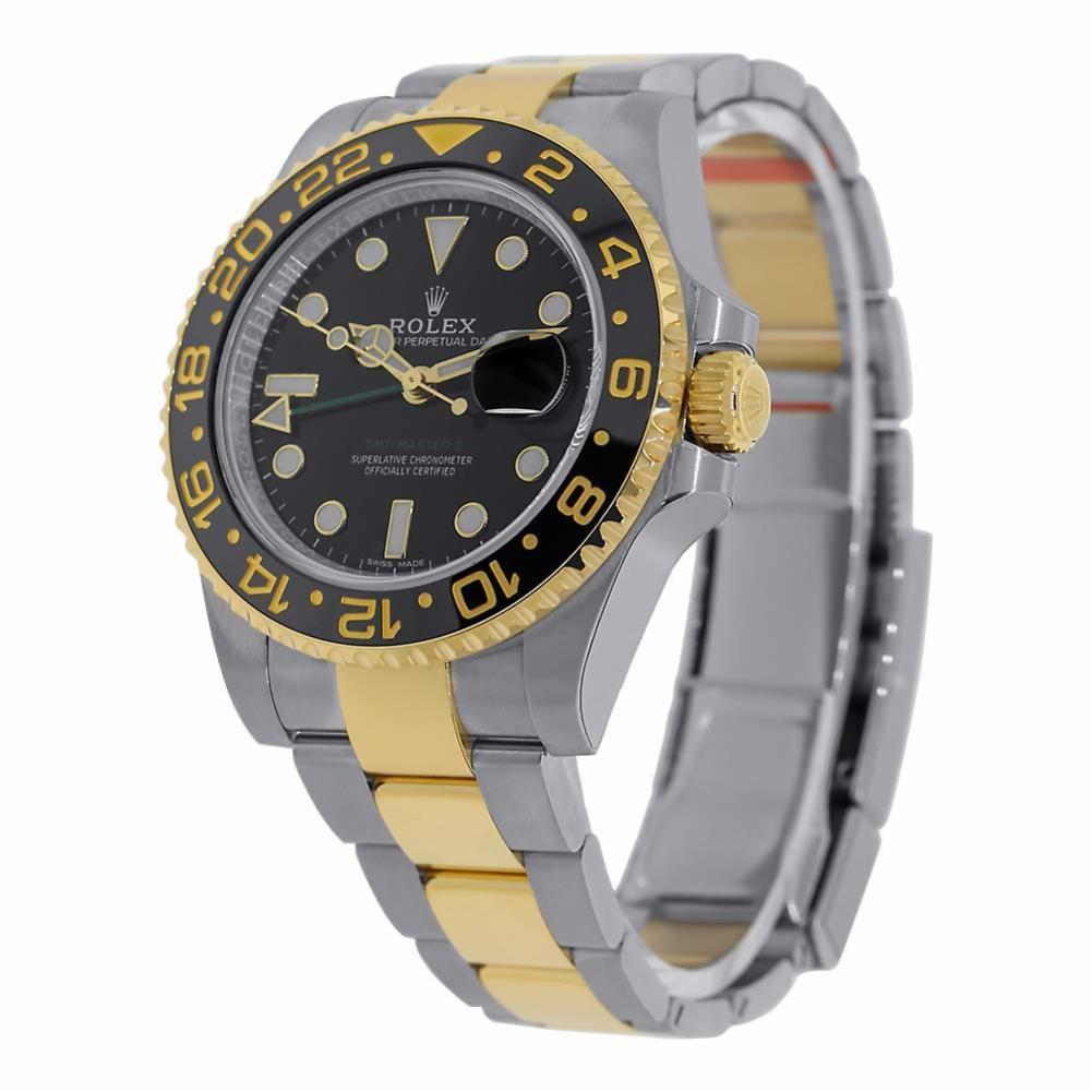 Rolex GMT-Master II Stainless Steel and 18 Karat Yellow Gold Watch 116713 In Excellent Condition In Miami, FL