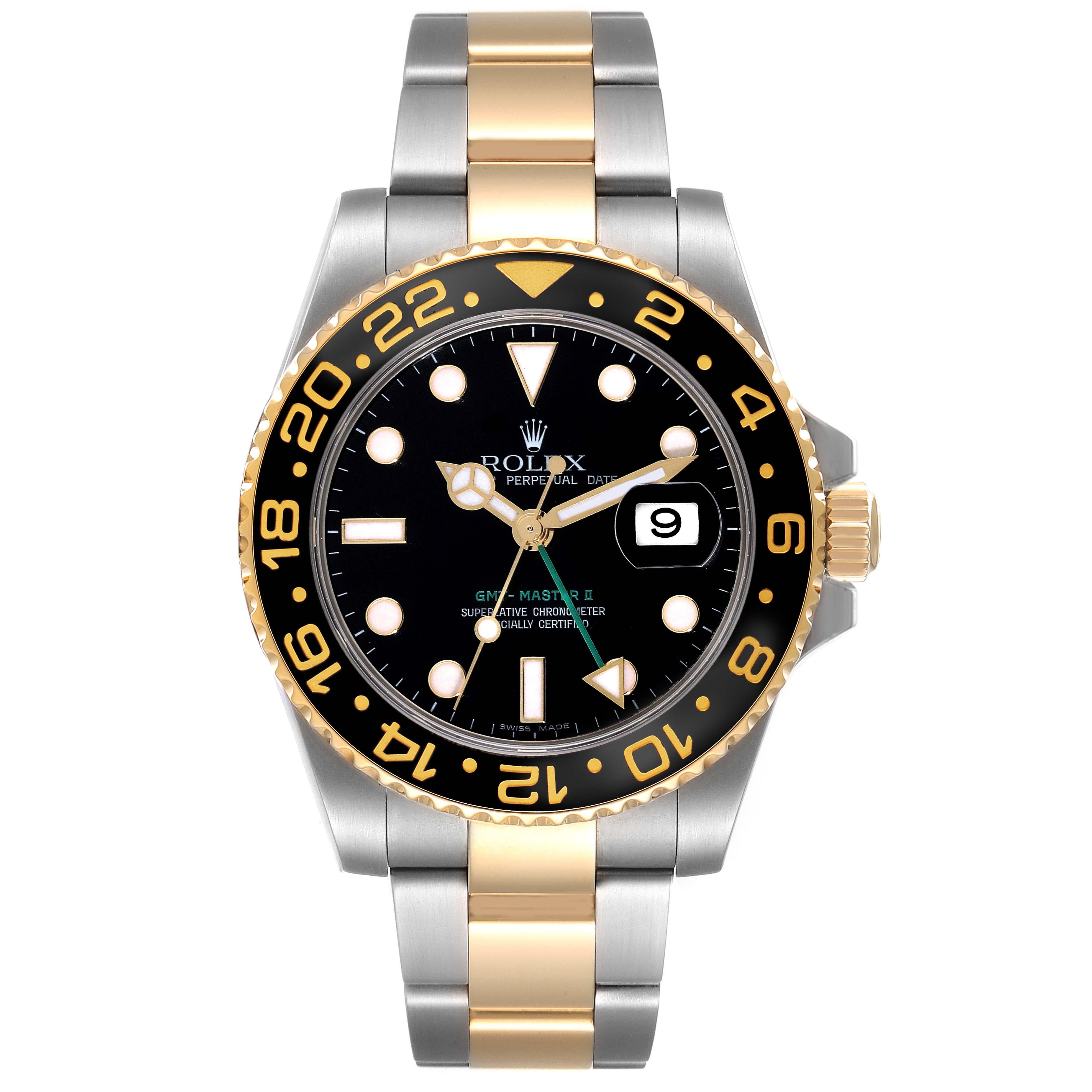Rolex GMT Master II Steel Yellow Gold Black Dial Mens Watch 116713 Box Card. Officially certified chronometer automatic self-winding movement. Stainless steel case 40 mm in diameter. Rolex logo on the crown. 18k yellow gold bidirectional rotating