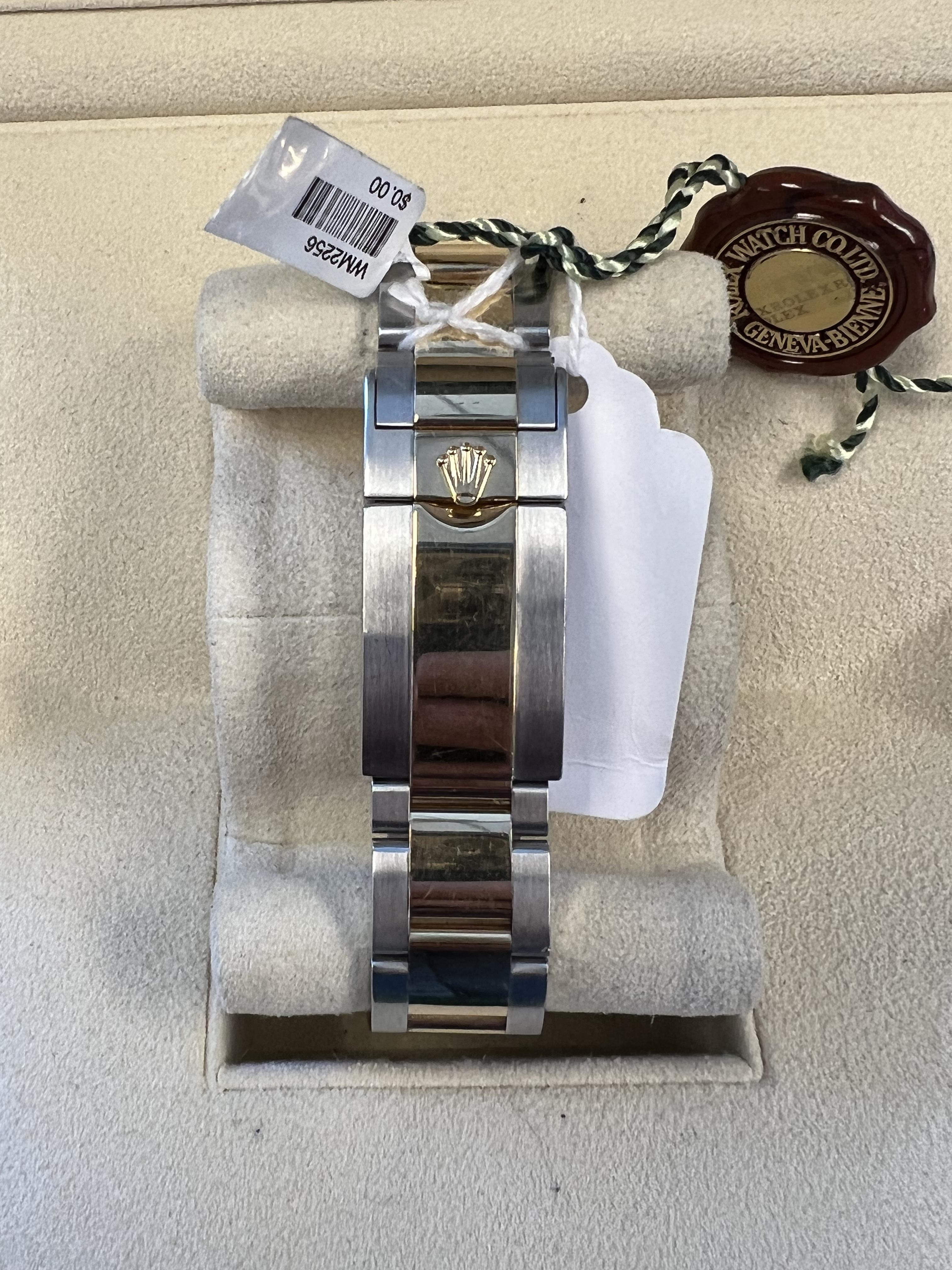 Men's Rolex GMT-Master II Two Tone Yellow Gold Black Dial For Sale