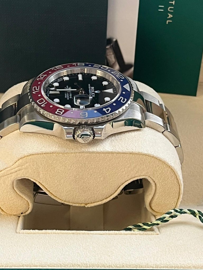 Rolex GMT Master II Or blanc Cadran noir Lunette Pepsi Montre Homme  116719BLRO En vente sur 1stDibs