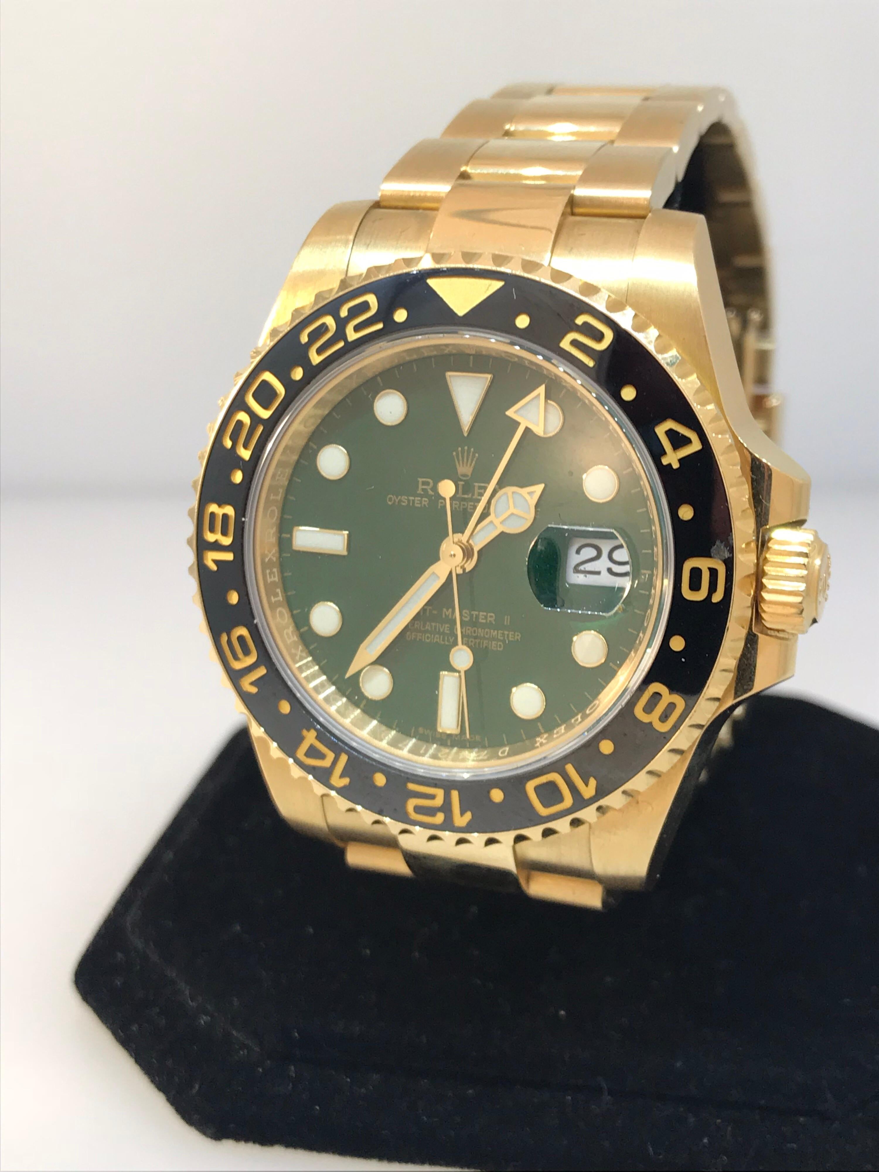Rolex GMT Master II Men's Watch

Model Number: 116718GSO

100% Authentic

Preowned in Excellent Condition

Comes with original Rolex Box & Papers

18 Karat Yellow Gold Case & Bracelet

Bidirectional Rotating Bezel

Green Dial

Dot Hour