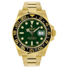 Rolex GMT Master II Yellow Gold Green Dial Watch 116718