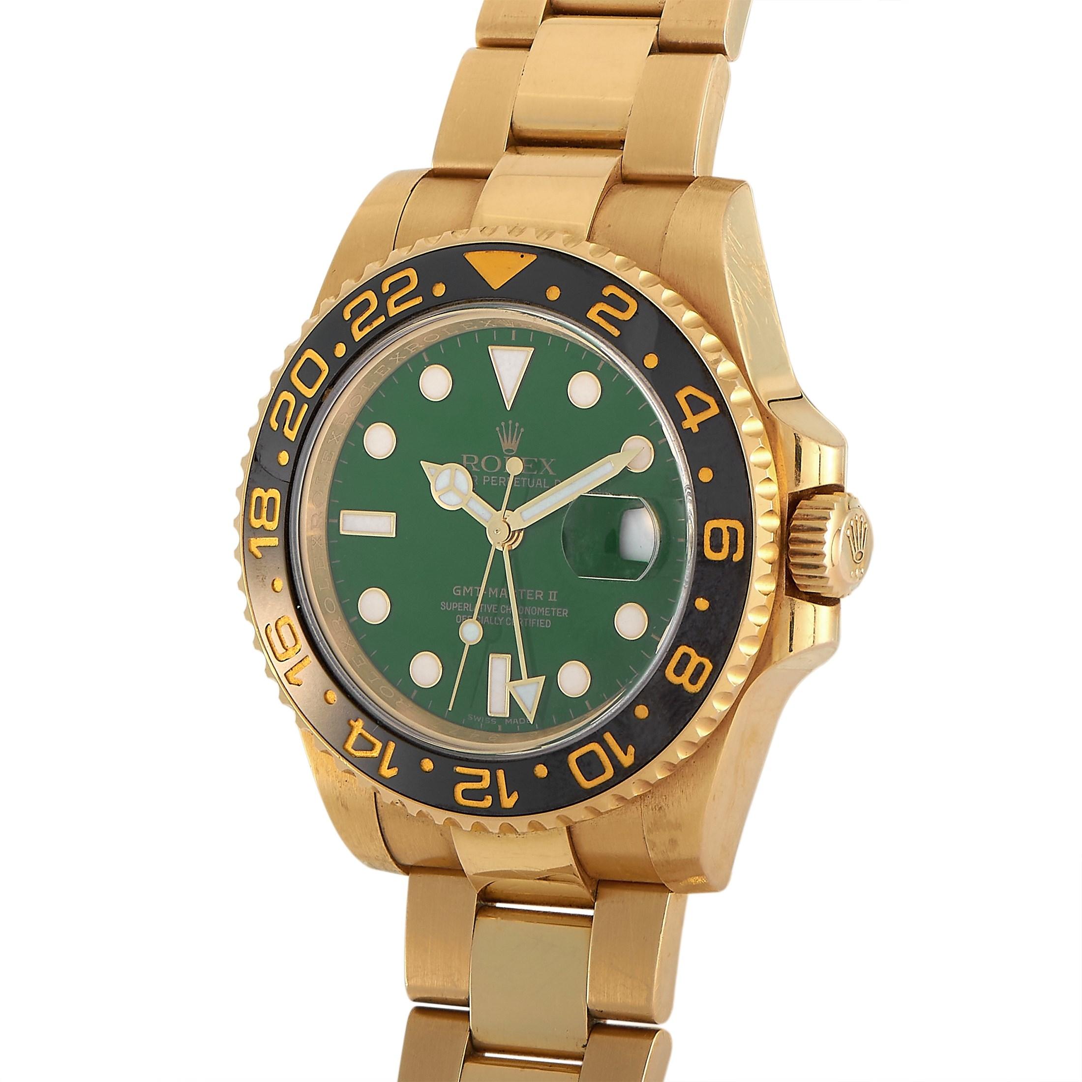 First introduced in 2005 during Rolex's 50th anniversary celebration, the Rolex GMT-Master II 18K Yellow Gold 50th Anniversary Green Dial Watch 116718 displays a striking and stunning green 