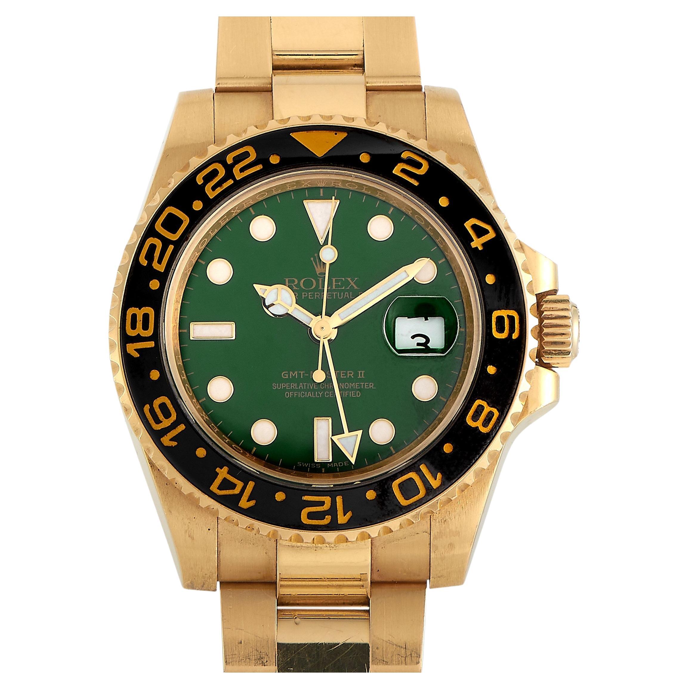Rolex GMT-Master II Yellow Gold Green Dial Watch 116718LN