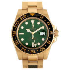 Rolex GMT-Master II Yellow Gold Green Dial Watch 116718LN