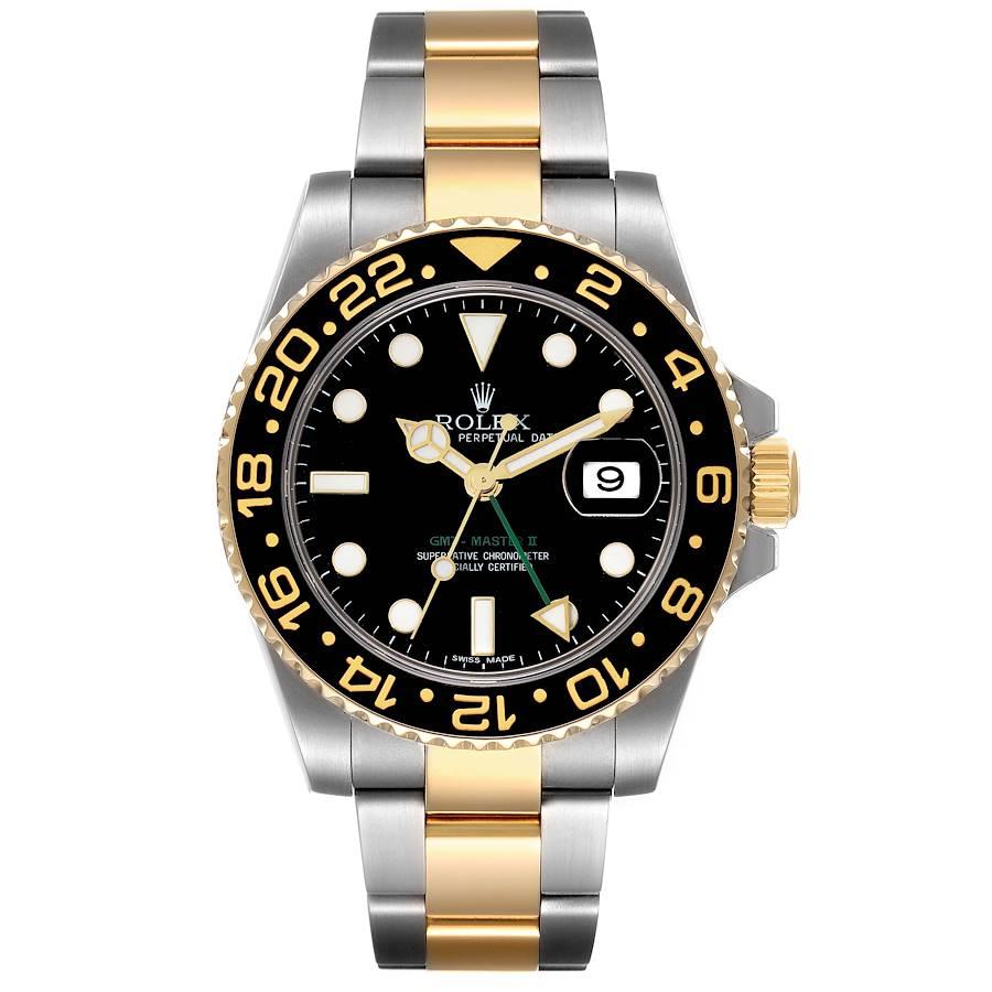 Rolex GMT Master II Yellow Gold Steel Black Dial Mens Watch 116713 Box Card. Officially certified chronometer self-winding movement. Stainless steel case 40 mm in diameter. Rolex logo on a crown. 18k yellow gold bidirectional rotating bezel with a