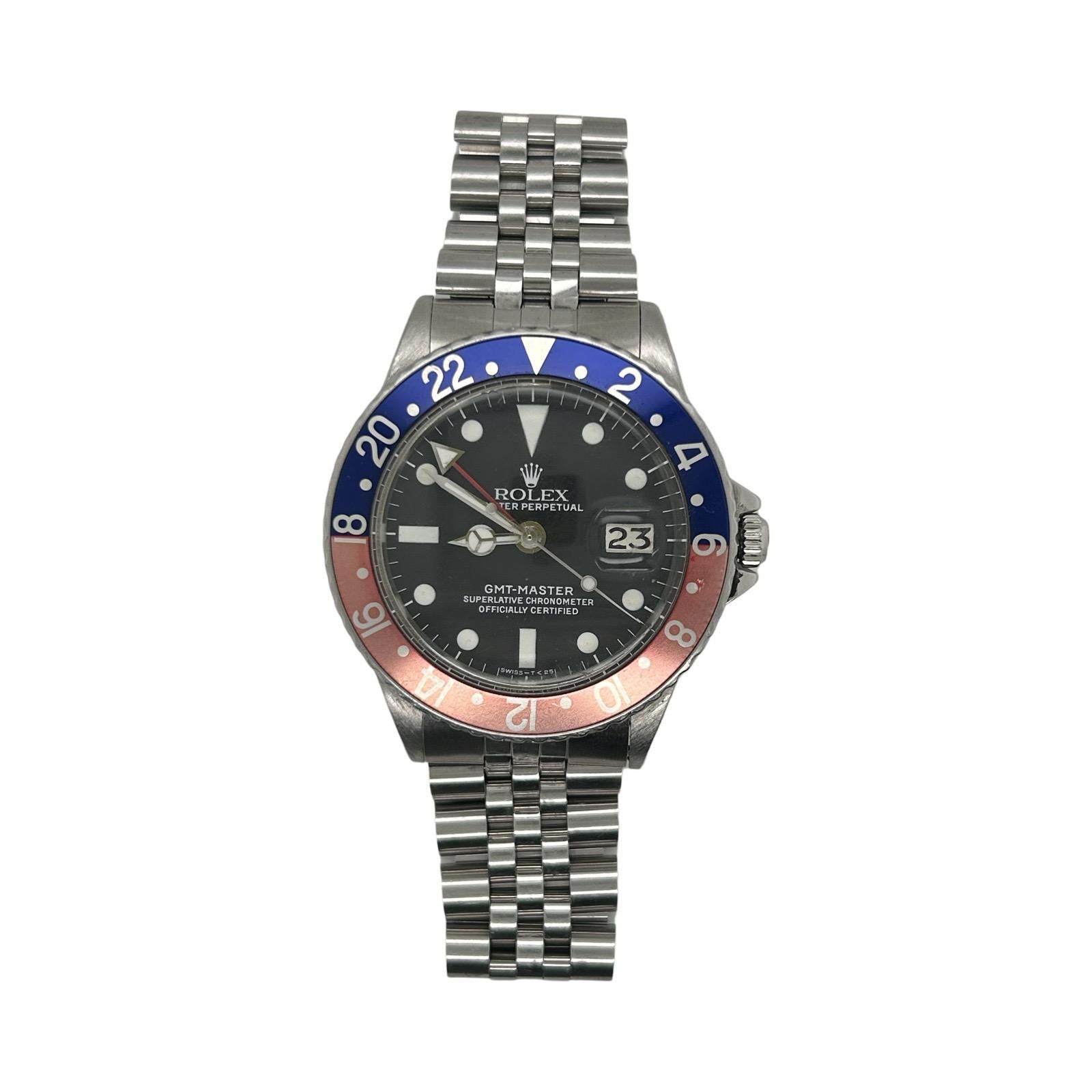 Brand: Rolex
Model Name: GMT Master
Model Number: 1675
Movement: Automatic
Case Size: 40 mm
Case Material: Stainless Steel
Dial: Black Dial/Luminous Hour Markers
Bezel: Pepsi
Hour Markers: Hour Stick
Bracelet: Stainless Steel
Features: Hours,