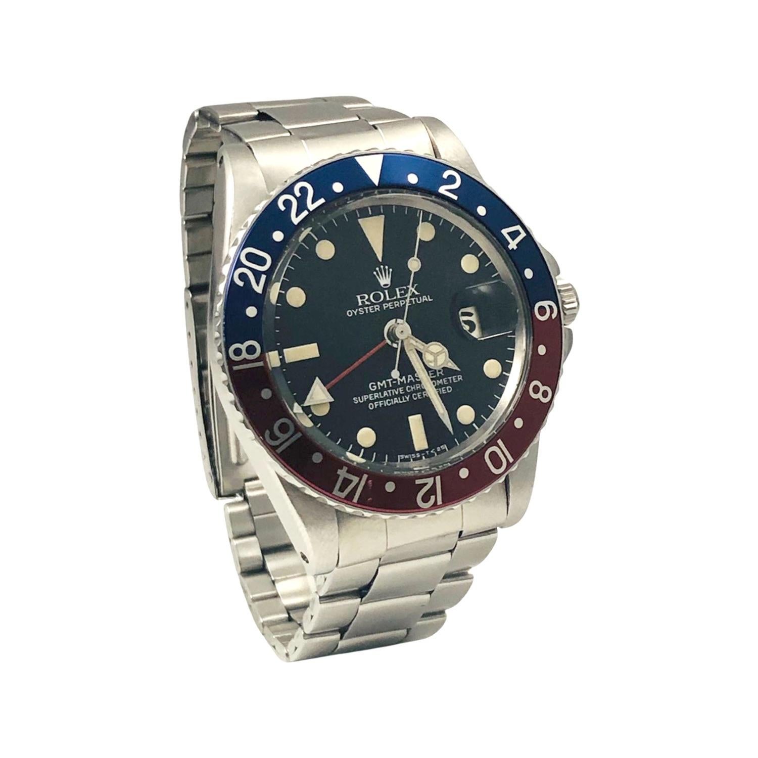 DESCRIPTION

Brand: Rolex

Model Name: GMT Master

Model Number: 1675

Movement: Automatic

Case Size: 40 mm

Case Material: Stainless Steel

Dial: Black Dial/Luminous Hour Markers

Bezel: Pepsi

Hour Markers: Hour Stick

Bracelet: Stainless