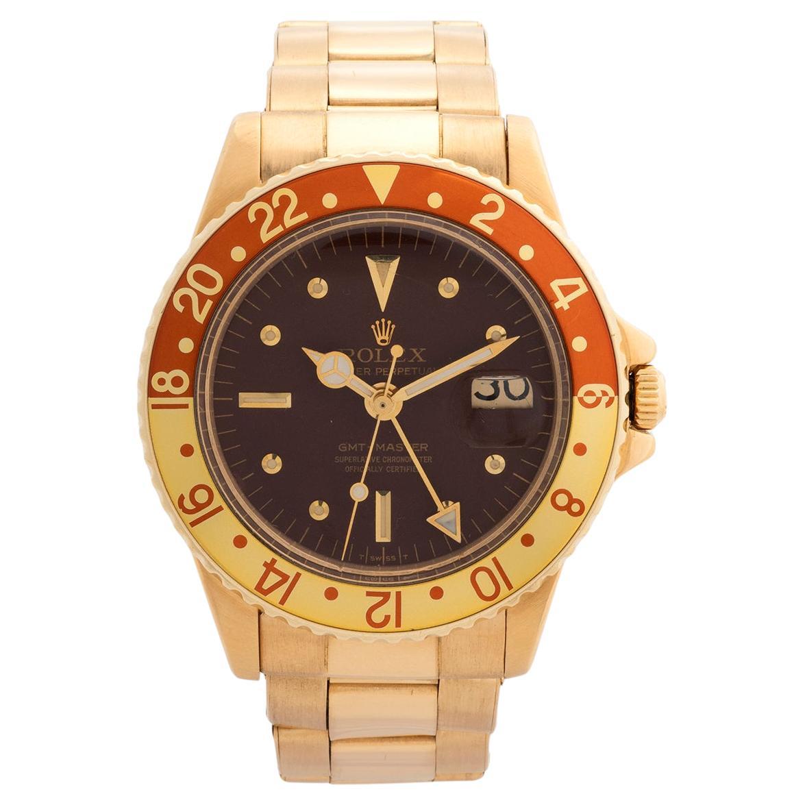 Rolex GMT Master reference 1675 / 8 18K Yellow Gold Wristwatch, 'Root Beer' 1972 In Good Condition For Sale In Canterbury, England
