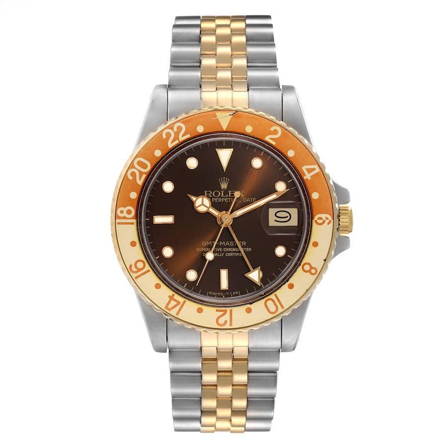 Rolex GMT Master Rootbeer Yellow Gold Steel Vintage Mens Watch 16753. Officially certified chronometer self-winding movement. Stainless steel case 40 mm in diameter. Rolex logo on a crown. 18k yellow gold bidirectional rotating bezel with a special