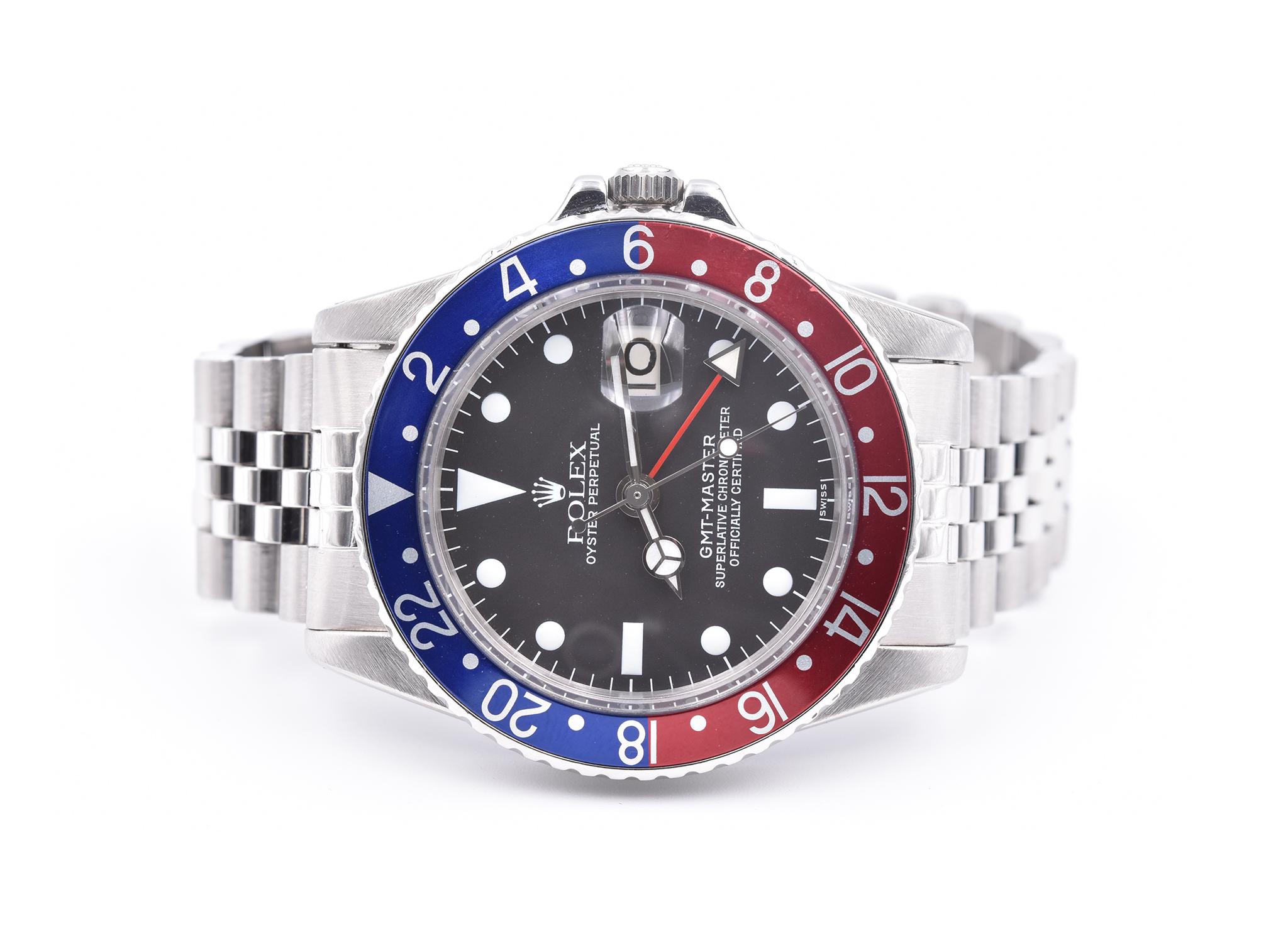 Movement: automatic 
Function: hours, minutes, seconds, date
Case: 40mm stainless-steel case, acrylic crystal, stainless steel bezel with blue and red Pepsi insert, stainless steel screw-down crown, waterproof to 330 meters
Band: stainless-steel