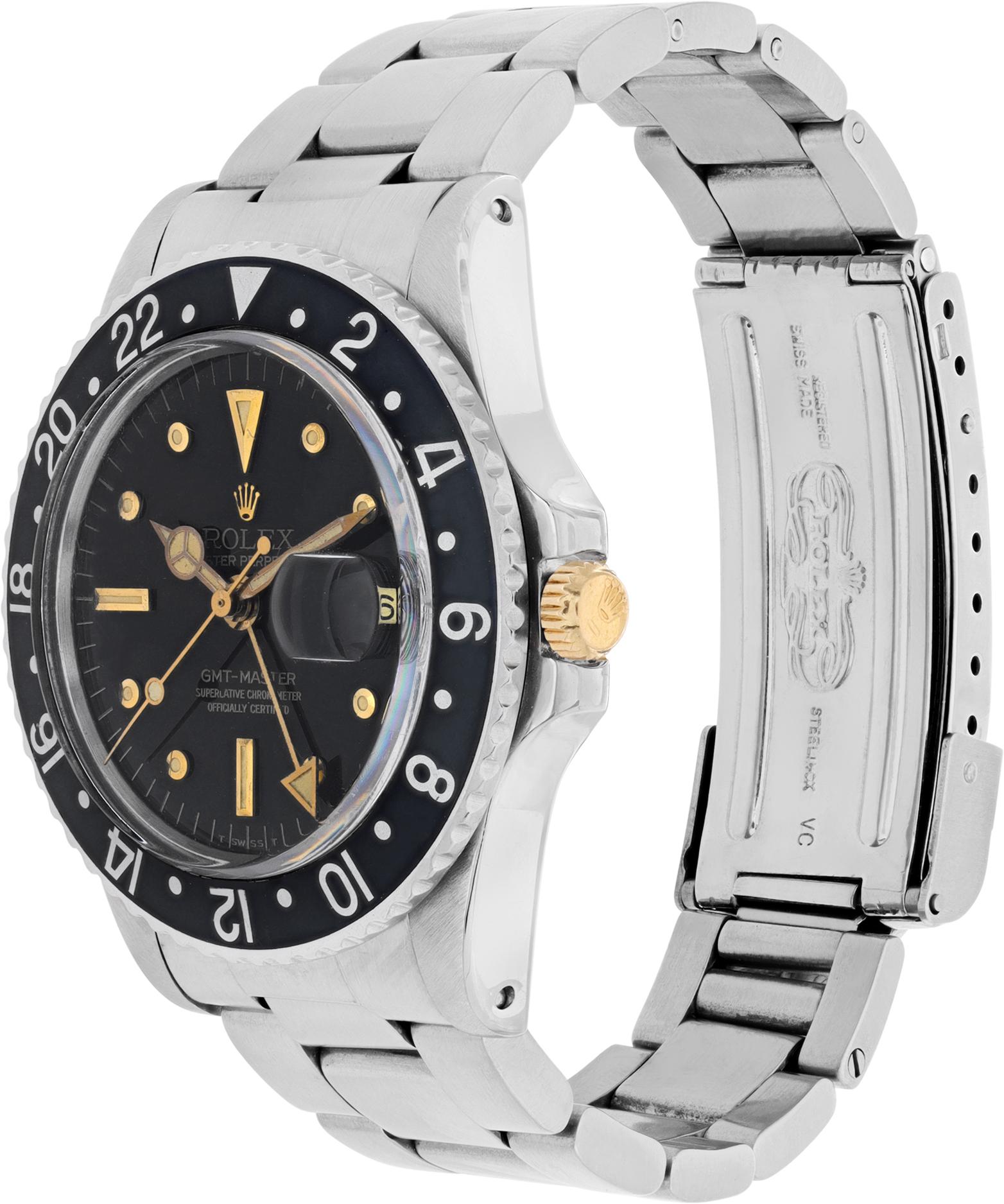 Rolex GMT-Master de acero inoxidable. Automático con fecha, hora dual y barrido de segundos. Esfera negra original con tetones de oro (originalmente se encontraban en los GMT de 18 quilates) e impresión y corona de oro. Caja de 40 mm. **Sólo hilo