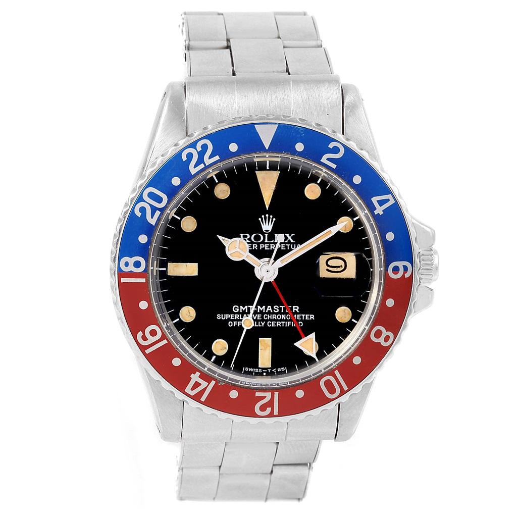 Rolex GMT Master Vintage Red and Blue Pepsi Bezel Mens Watch 1675. Automatic self-winding movement. Stainless steel oyster case 40.0 mm in diameter. Rolex logo on a crown. Stainless steel bidirectional rotating bezel with a special Pepsi 24-hour