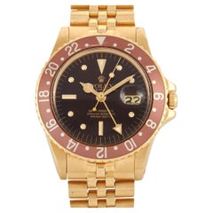 Rolex Montre GMT-Master en or jaune 1675/8