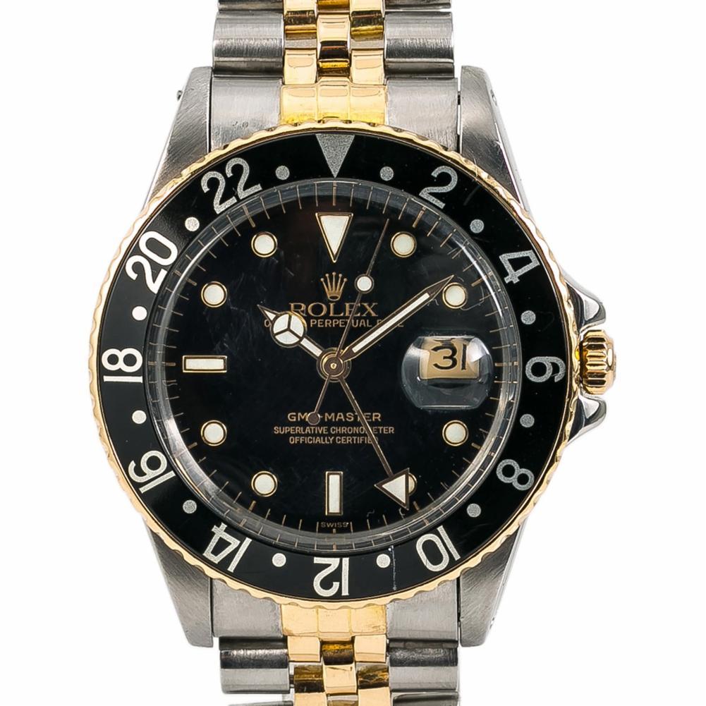 Rolex GMT Master 16753, Black Dial Certified Authentic In Good Condition For Sale In Miami, FL