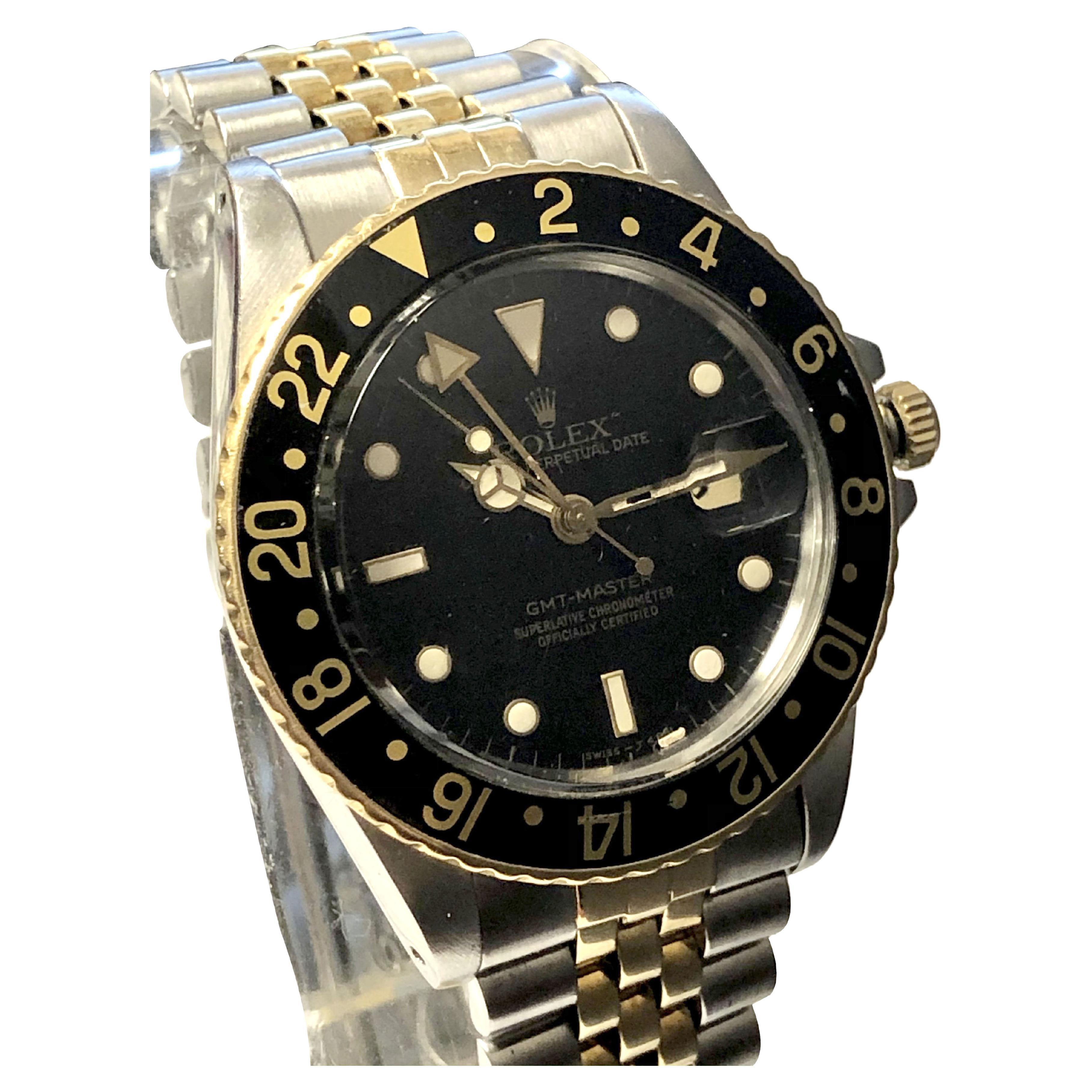 Circa 1985 Rolex GMT, Reference 16753, 40 M.M. Stainless Steel 3 piece Oyster Case with 14K 24 Hour Rotating Bezel, Original insert, Acrylic Crystal with Date Bubble. Caliber 3075, 27 jewel Automatic Self winding movement.  Original Black dial with