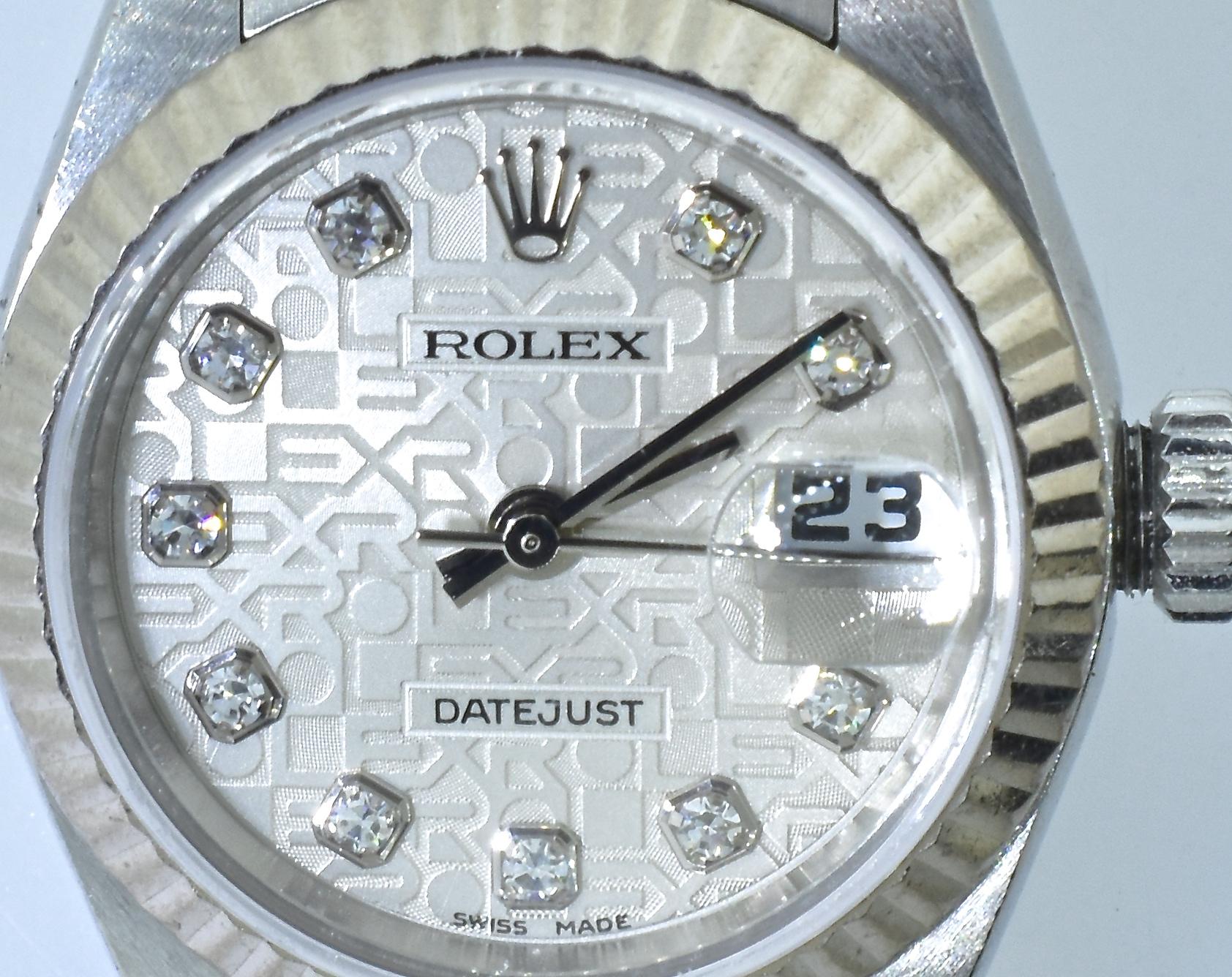 Vintage Ladies Rolex wrist watch - authentic and guaranteed, with the original fancy silver diamond jubilee dial,  date-just with sweep second hand.  Scratch resistant sapphire crystal with cyclops magnifier. In fine condition and accompanied by our