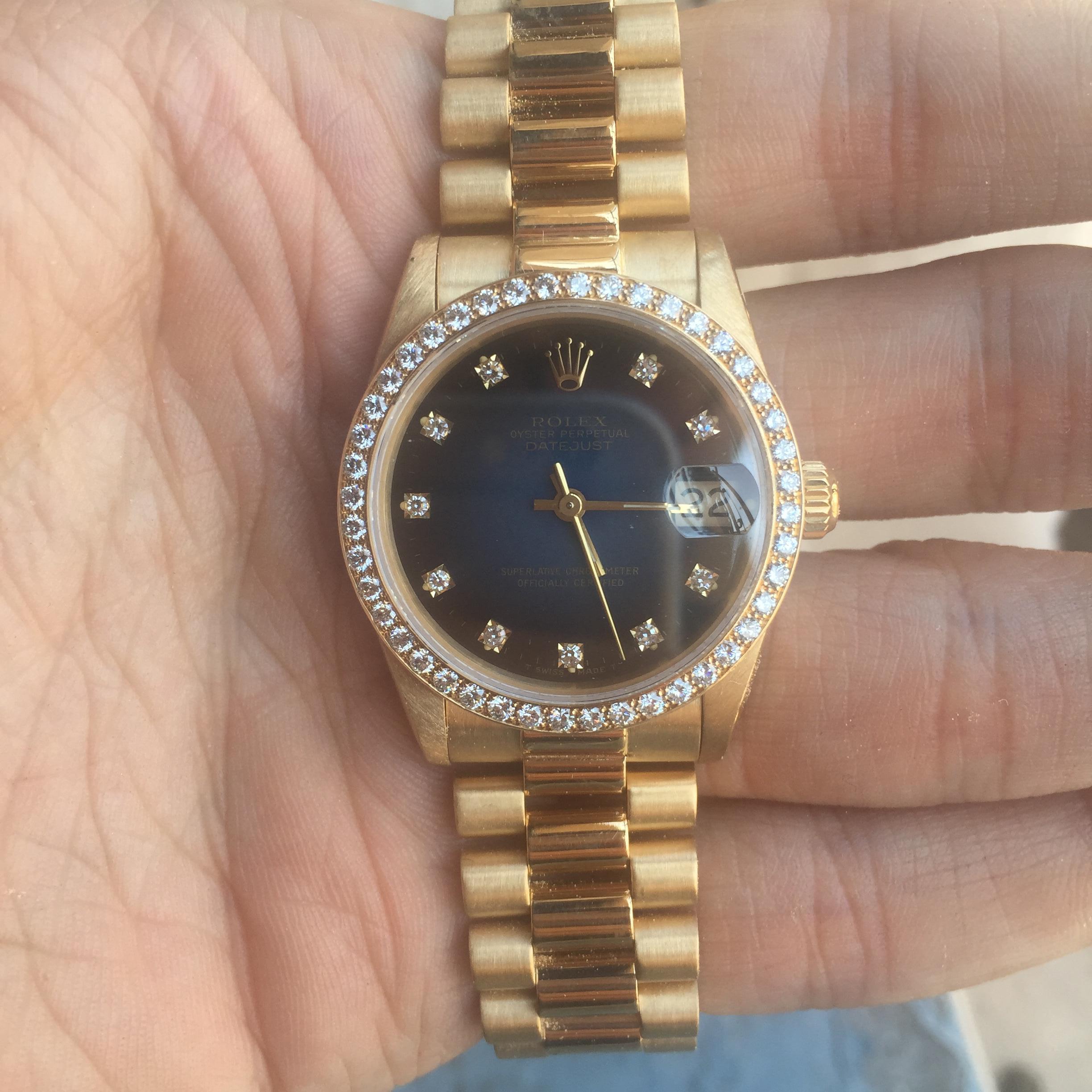 If you want a different dial color like black with diamond or silver with diamond or any color let me know and I can probably change it for you.

Selling a Very Good Condition 18k Yellow Gold Ladies Datejust With Factory Blue Vignette Diamond Dial