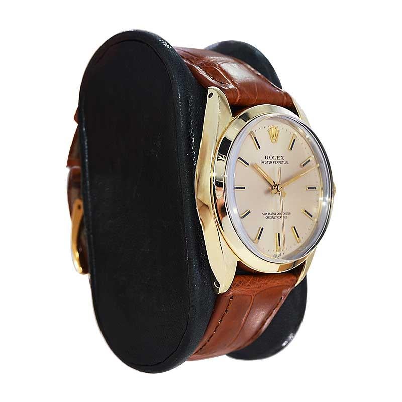 FACTORY / HOUSE: Rolex Watch Company
STYLE / REFERENCE: Oyster Perpetual / Reference 1004
METAL / MATERIAL: Gold Shell
CIRCA / YEAR: Mid 1980's
DIMENSIONS / SIZE: Length 40mm X Diameter 34mm
MOVEMENT / CALIBER: Perpetual Winding / 26 Jewels 
DIAL /