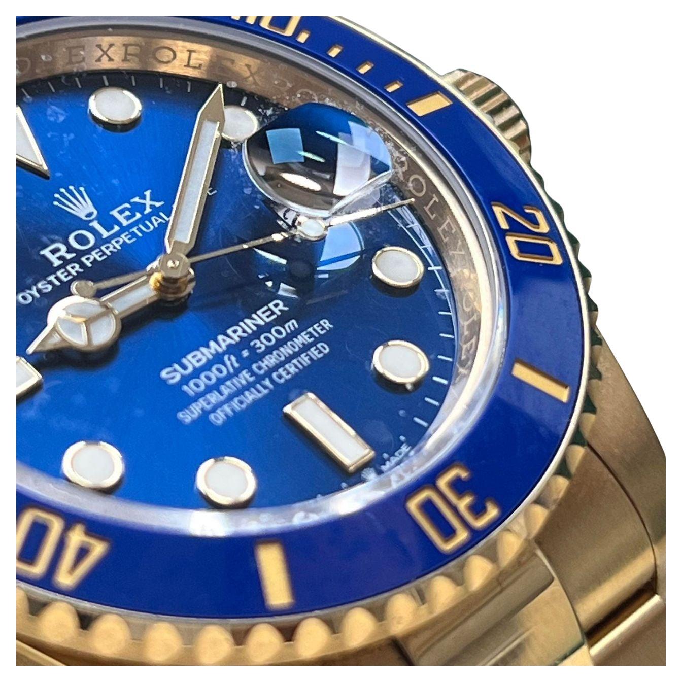 Introducing the Rolex Gold Submariner 126618LB Blue, a pinnacle of luxury and craftsmanship.

This exquisite timepiece features a stunning all-gold design, radiating elegance and refinement. The vibrant blue dial adds a touch of sophistication,