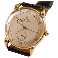 Rolex Important and extremely rare solid 18 k gold cased vintage watch