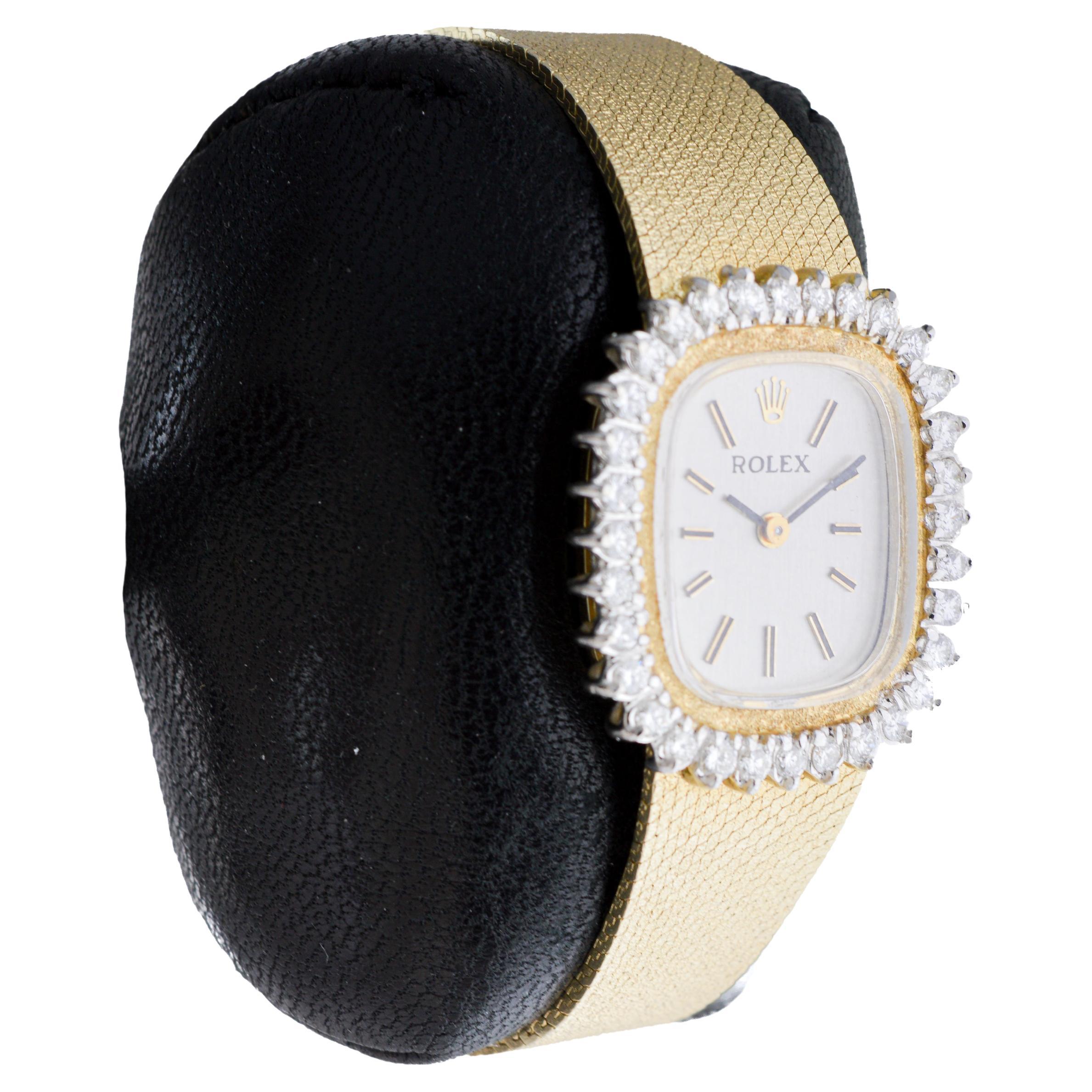 FACTORY / HOUSE: Rolex Watch Company
STYLE / REFERENCE: Bracelet Dress Watch 
METAL / MATERIAL: 14Kt Solid Gold
CIRCA / YEAR: 1970's
DIMENSIONS / SIZE: Length 27mm X Width 24mm
MOVEMENT / CALIBER: Manual Winding / 18 Jewels / Caliber 1400 
DIAL /