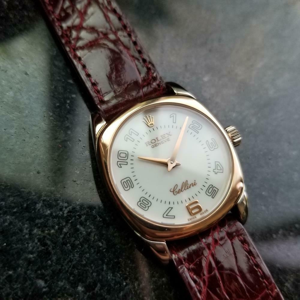 Timeless luxury, ladies 18k rose and white gold Rolex Cellini Danaos ref.6229 quartz dress watch, c.2001. Verified authentic by a master watchmaker. Gorgeous white Rolex signed dial, Arabic numeral hour markers, applied Arabic numeral 6, gold minute