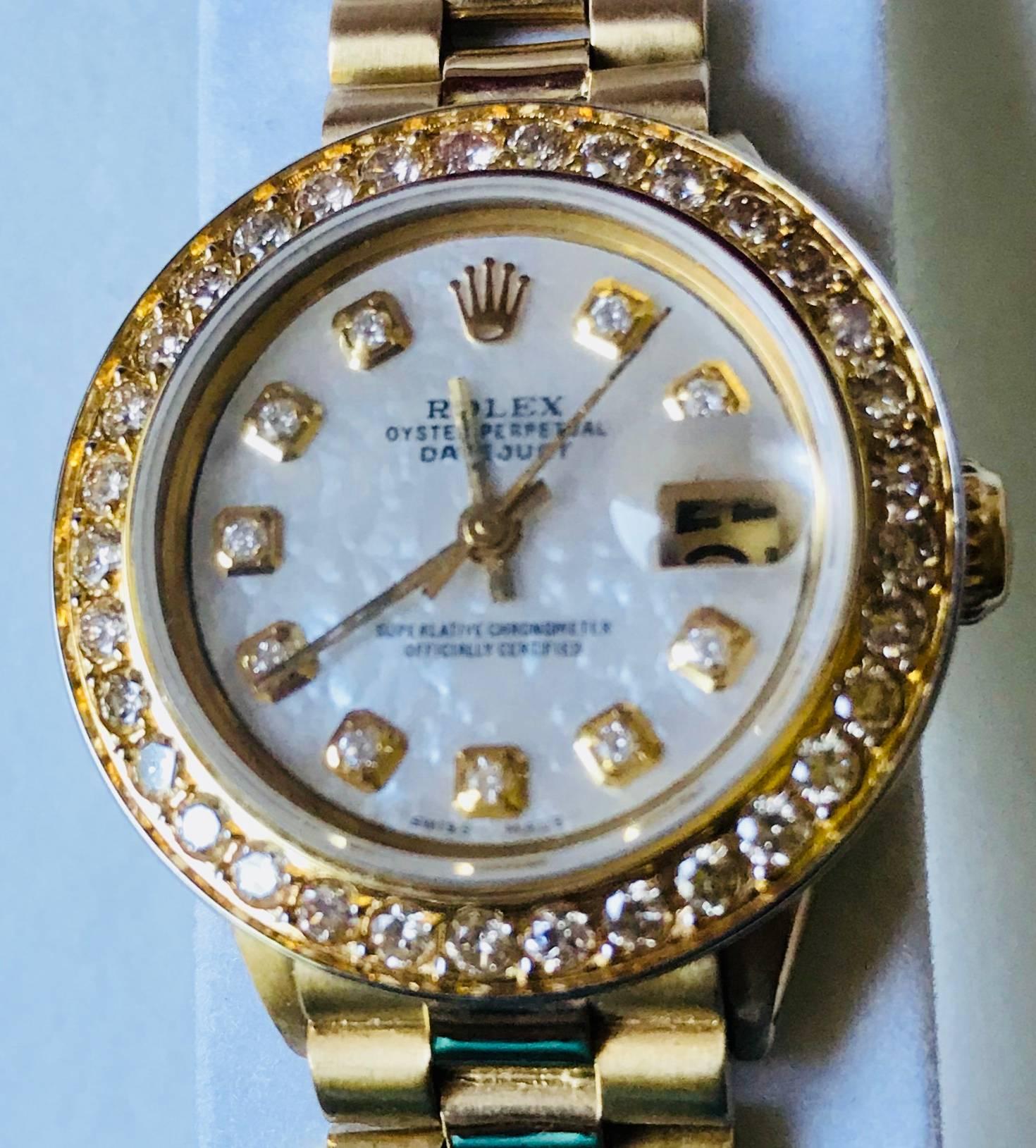 MATERIAL
18 ct yellow gold Mint condition as good as brand new 
Oyster, 31 mm, yellow gold and diamonds
DIAL
White mother-of-pearl set with diamonds
BRACELET
President, semi-circular three-piece link
GEM-SETTING
Diamonds in 18 ct gold Bezel