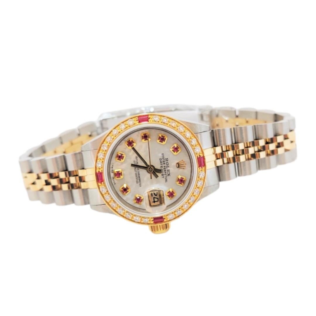 (Watch Description)
Brand - Rolex
Gender - Ladies
Model - 6917 Datejust
Metals - Yellow Gold / Steel 
Case size - 26mm
Bezel -Yellow Gold Diamond/Ruby
Crystal - Sapphire
Movement - Automatic caliber 2035
Dial - Mother Of Pearl ruby
Wrist band - Two