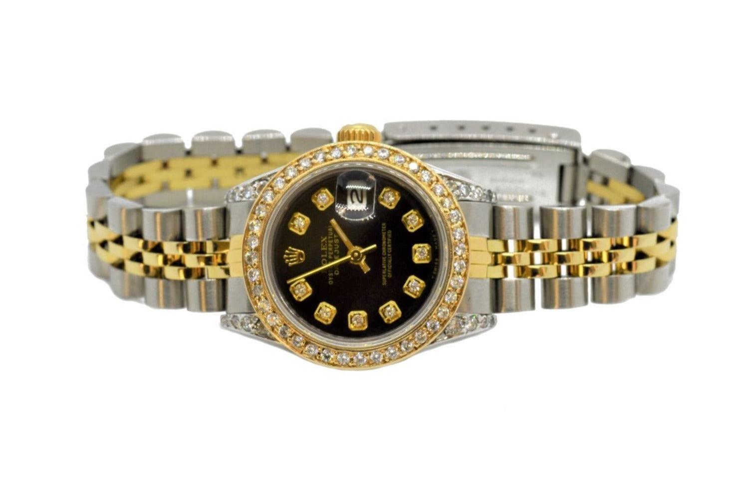 (Item Description)
Brand - Rolex
Style - Datejust
Case size - 26mm
Model - 69173
Metals - Steel/Yellow Gold
Crystal - Sapphire
Dial - Custom Black Diamond
Movement - Rolex Auto Cal-2135
Bezel - Custom Yellow Gold Diamond
Wrist Band - Rolex Two-Tone