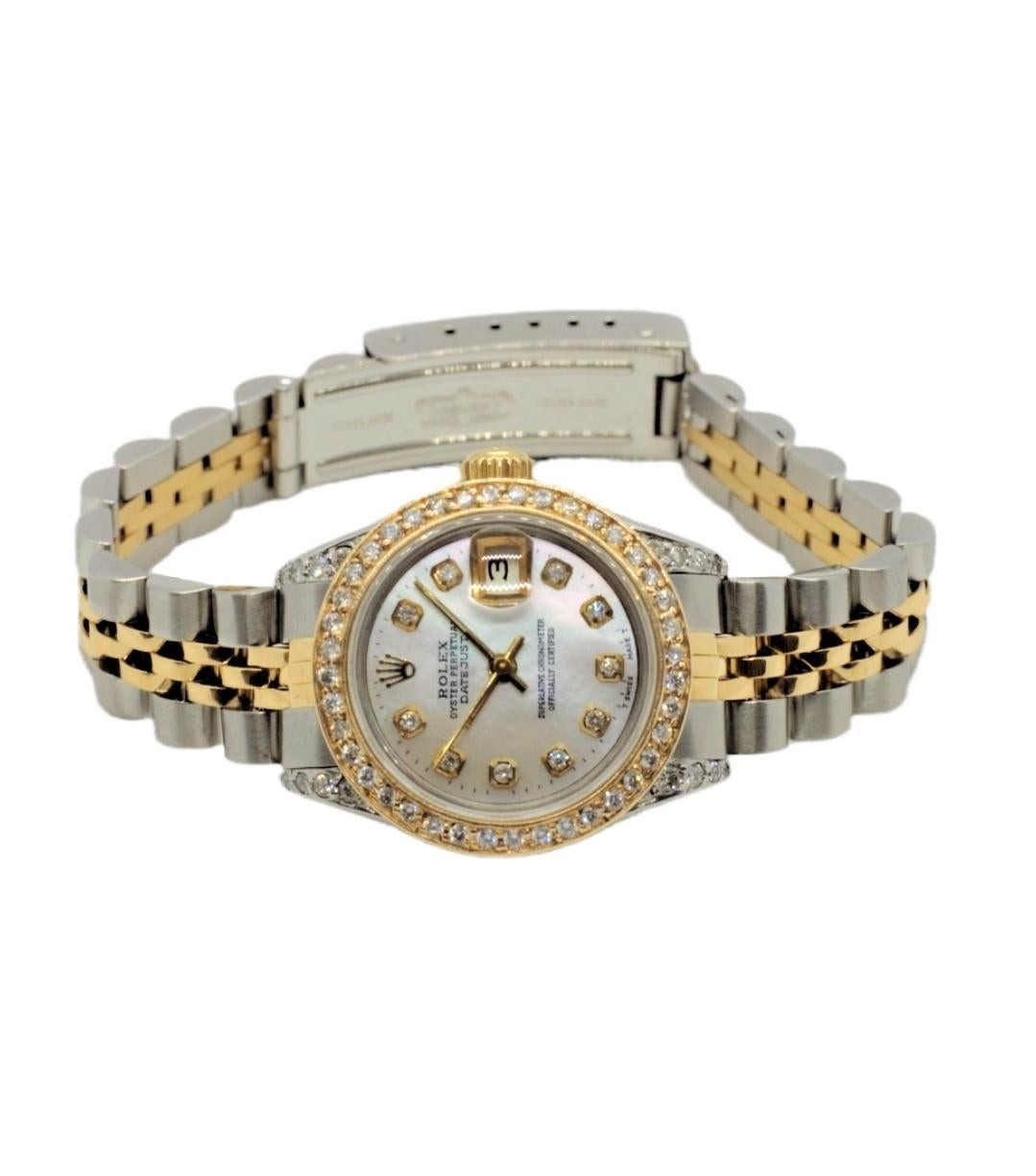 (Watch Description) 
Brand - Rolex
Gender - Ladies 
Model - 69173 Datejust
Metals - Yellow Solid Gold
Case size - 26mm
Bezel - Yellow gold Diamond
Crystal - Sapphire
Movement - Automatic Cal.2135
Dial - Refinished Red Diamond
Wrist band - Two Tone
