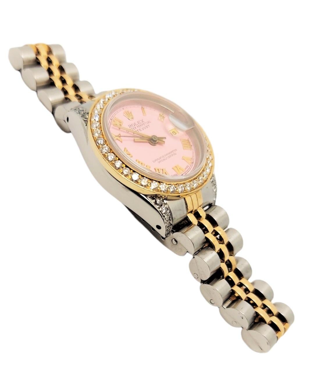 (WATCH DESCRIPTION)
Brand - Rolex
Style - Datejust
Model - 69173
Metals - Yellow gold/steel
Bezel - Custom Yellow gold Diamond
Dial - Custom Pink Roman numeral
Crystal - Sapphire
Movement - automatic CAL-2135
Band - Two Tone Jubilee

3 years