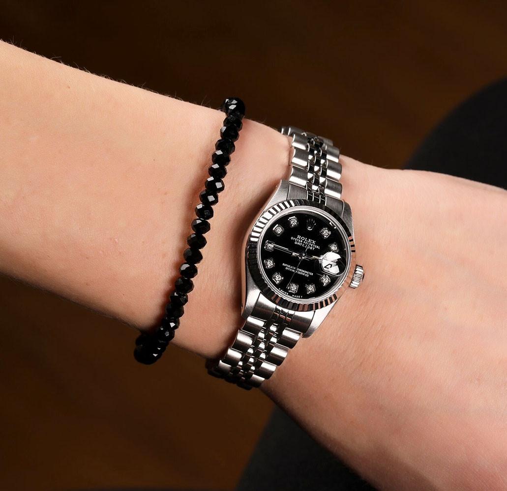 Rolex Ladies Datejust Montre-bracelet en acier inoxydable à cadran noir et bracelet jubilé en vente 3