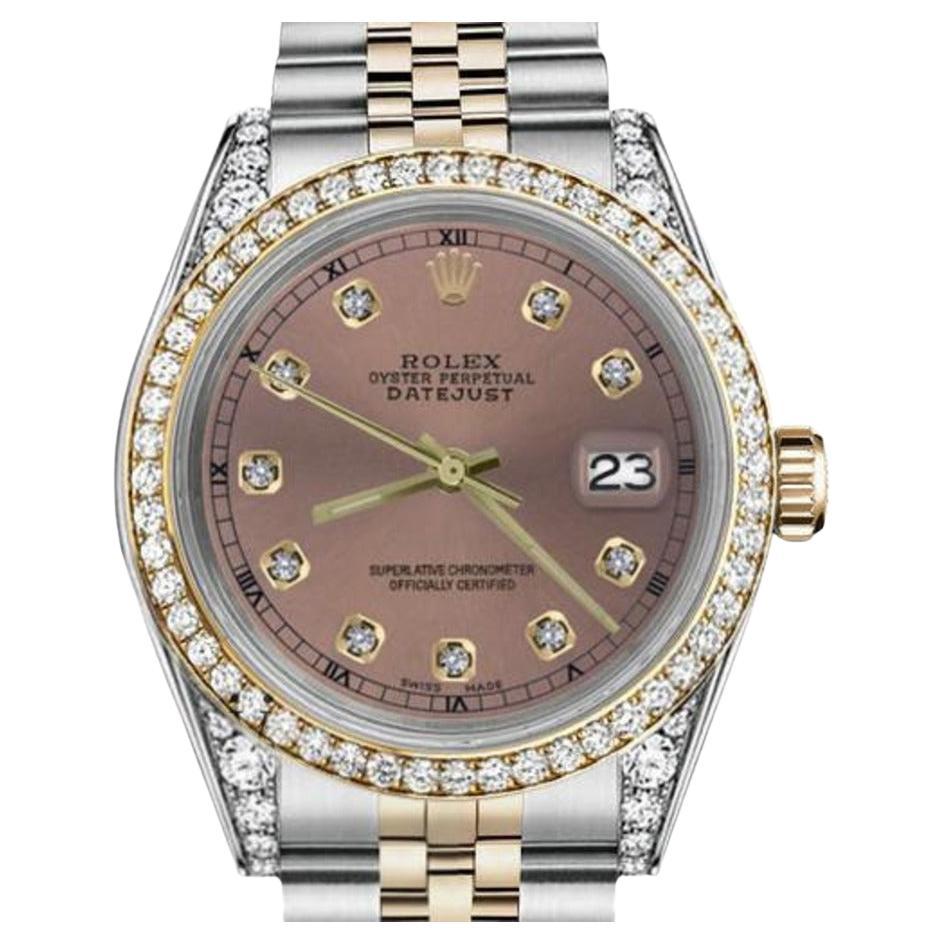 Reloj Rolex Datejust para señora con bisel y asas de diamantes en dos tonos y esfera salmón 69173