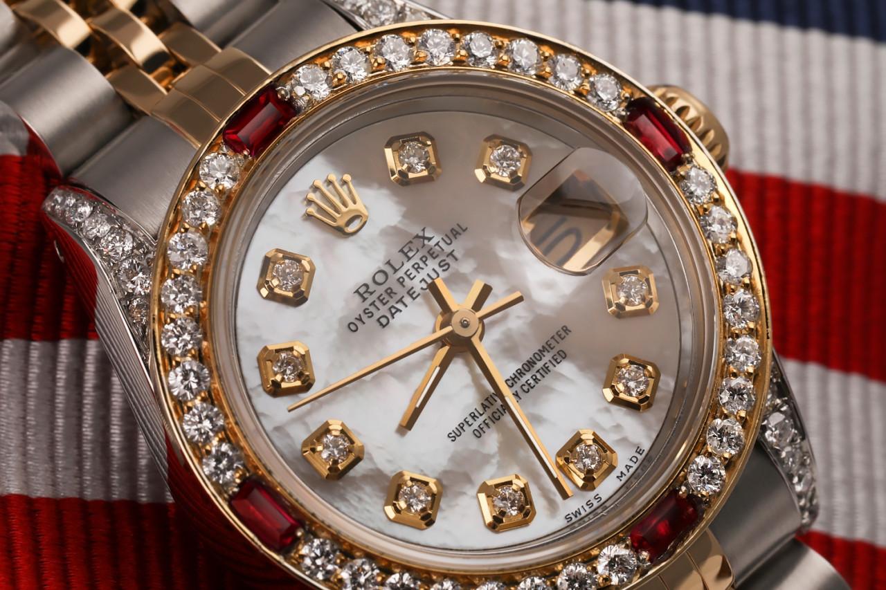 Rolex Datejust 26mm Custom White MOP Diamond Dial, Diamond/Ruby Bezel, and Diamond Lugs. Two Tone Watch with Jubilee Band 69173.

This watch is in like new condition. It has been polished, serviced, and has no visible scratches or blemishes. All our
