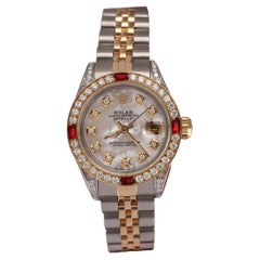 Rolex Montre Datejust bicolore avec cadran MOP blanc et diamants et rubis, pour femmes