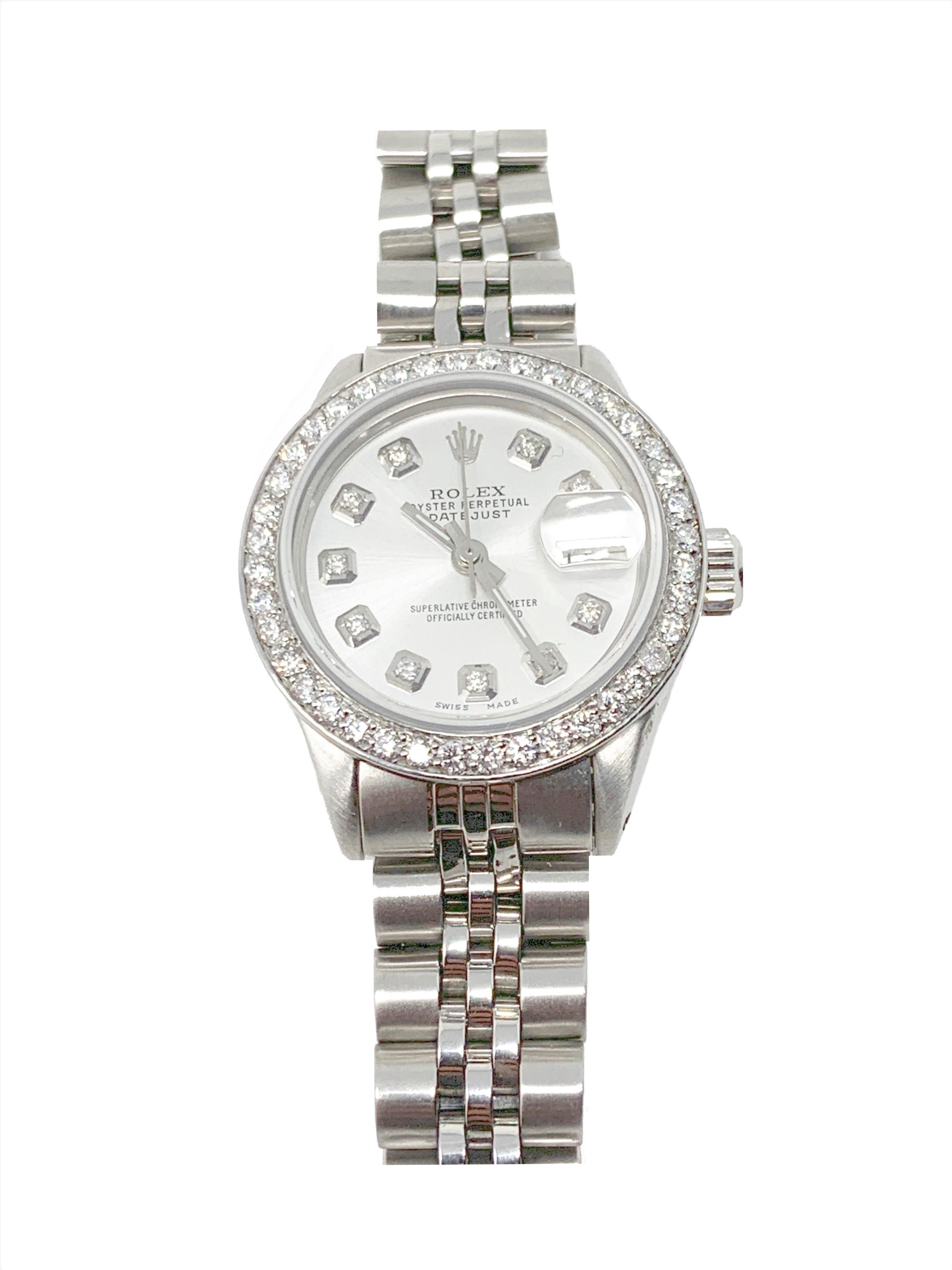 Brand - Rolex 
Model - 6919
Gender -Ladies 
Case Size - 26MM
Beze - Steel Diamond
Dial - Refinished Silver diamond 
Crystal - Sapphire
Movement - Automatic Rolex Cal.2030
Band - Steel Jubilee

Two Year In House Warranty 
New Generic Watch Box