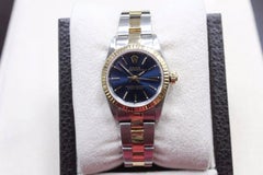 Rolex Ladies 76193 Oyster Perpetual Blue 18 Karat Gold and Steel Box and Papers