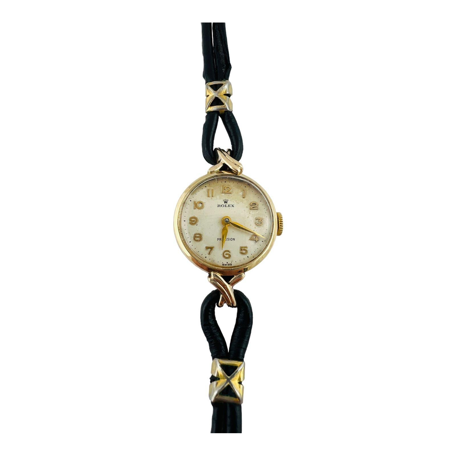 Rolex Ladies 9K Yellow Gold Precision Ladies Watch

This vintage ladies Rolex watch is set in 9K solid yellow gold

This precision model watch is from the late 1940's - 1950's

White dial with gold tone markers

Hand winding movement - 17