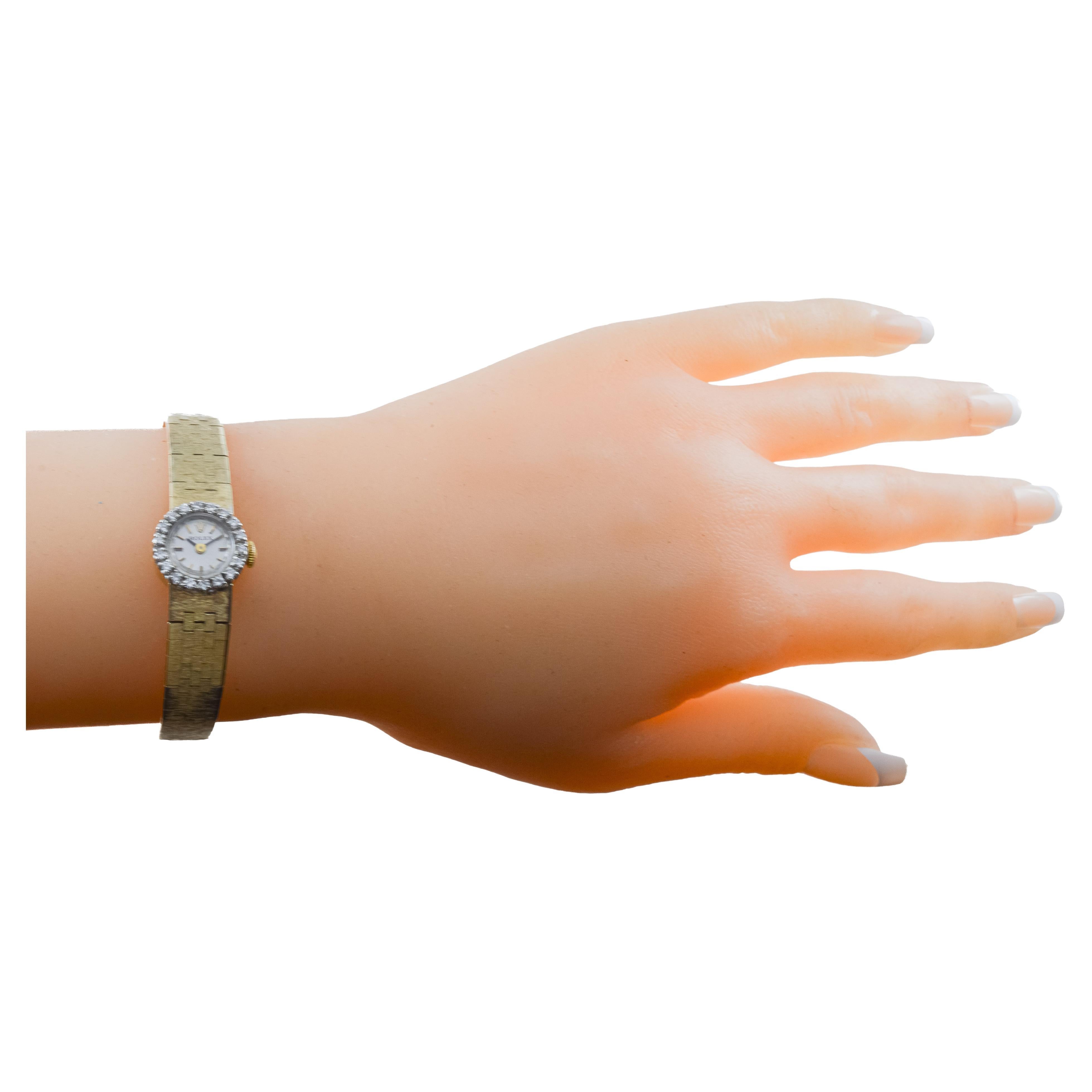 FACTORY / HOUSE: Rolex Watch Company
STYLE / REFERENCE: Dress Watch
METAL / MATERIAL: 14Kt Solid gold
CIRCA / YEAR: 1970's
DIMENSIONS / SIZE: Diameter 15mm
MOVEMENT / CALIBER: Manual Winding / 17 Jewels / Caliber 1400 
DIAL / HANDS: Factory Original