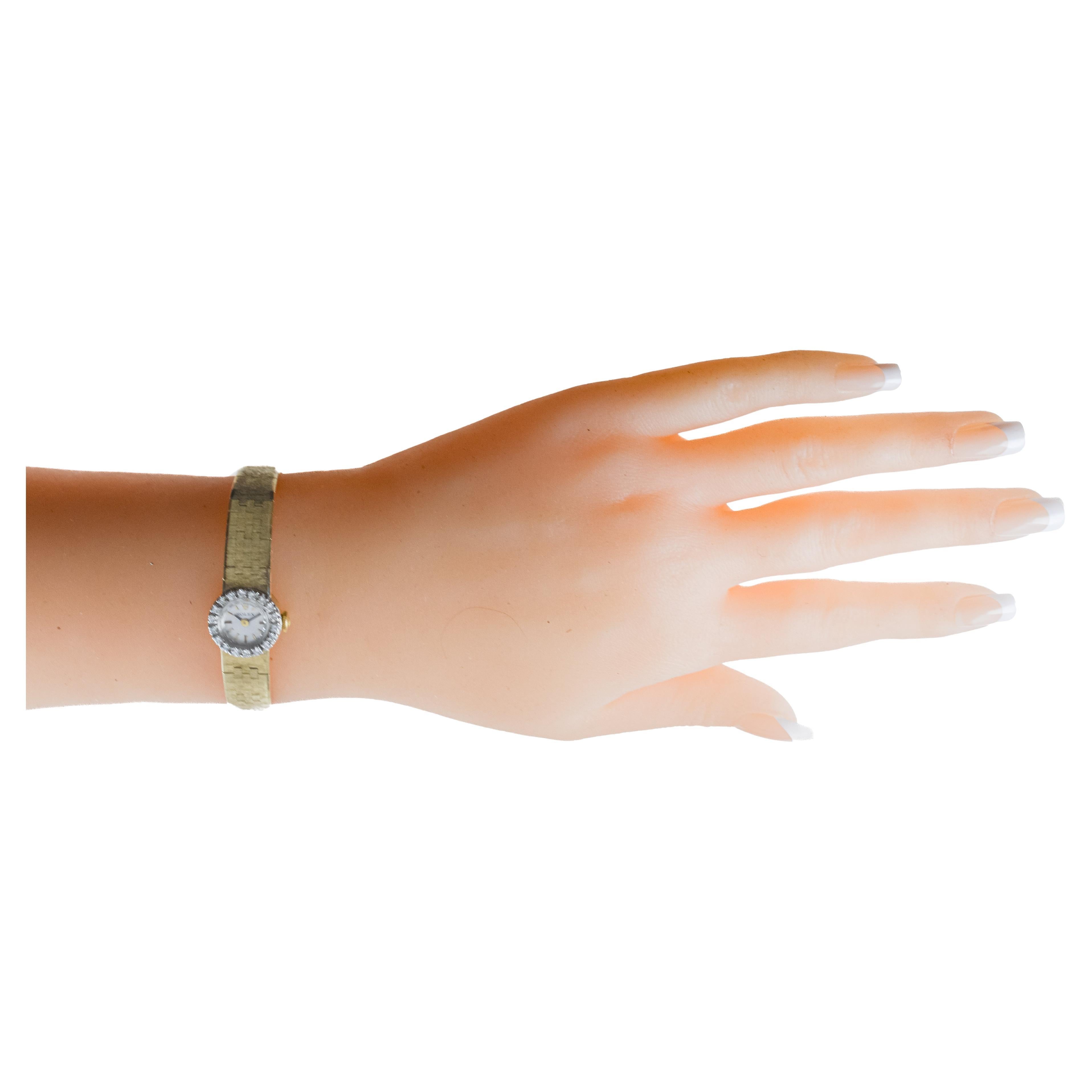 Rolex Ladies Art Deco 14Kt Solid Gold Watch with Diamond Bezel, circa 1970's In Excellent Condition In Long Beach, CA