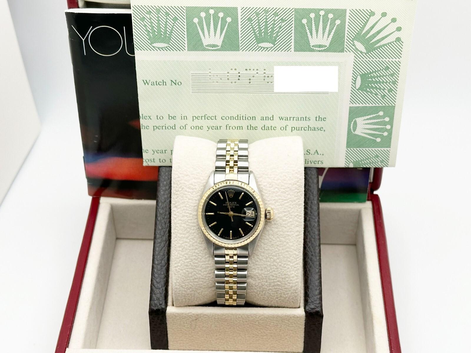 Rolex Ladies Date 6917 Black Dial 14K Yellow Gold Stainless Steel Box Paper In Excellent Condition For Sale In San Diego, CA