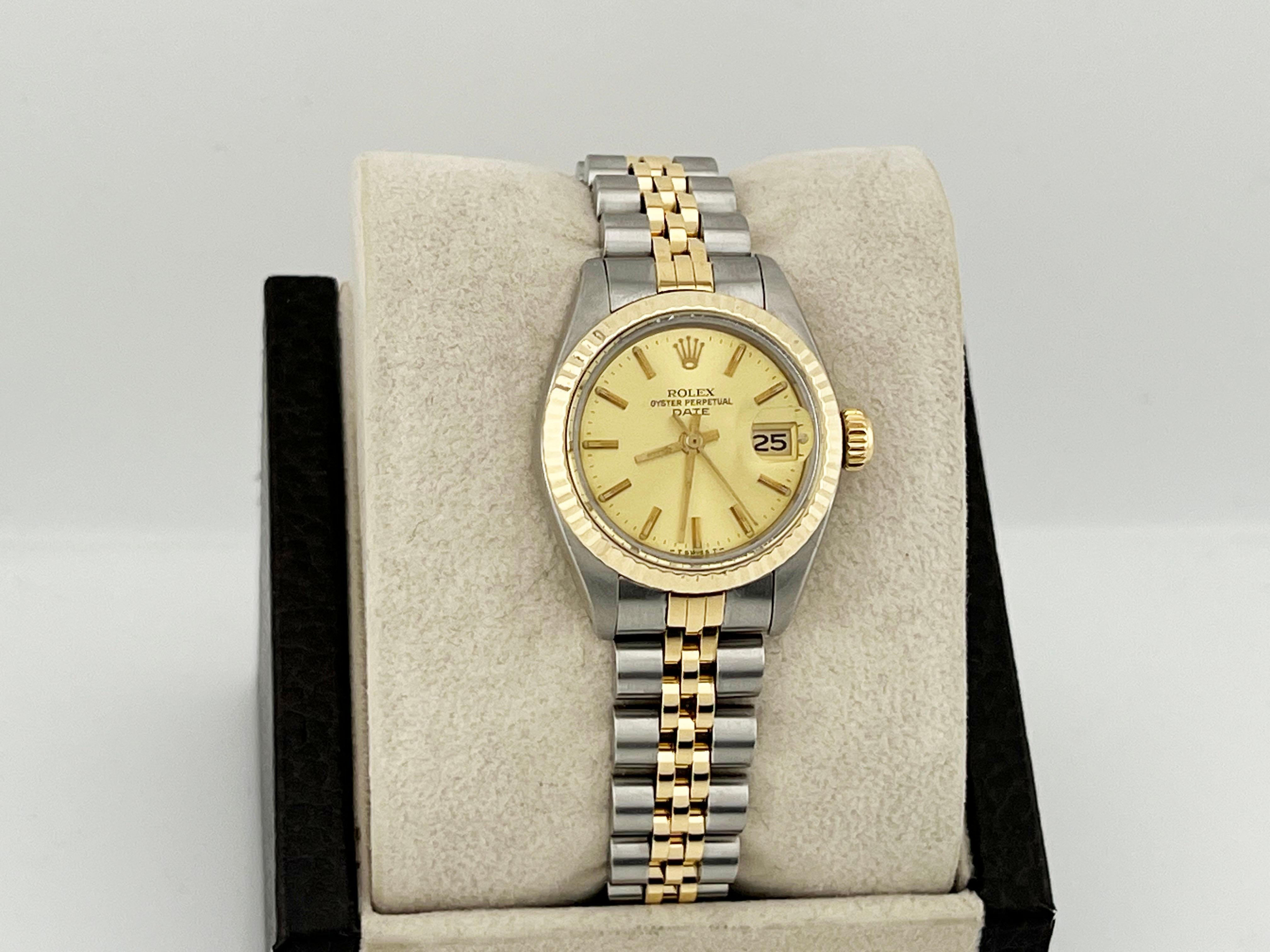 Rolex Ladies Date 6917 Champagne Dial 18K Yellow Gold Stainless Steel 26mm In Excellent Condition For Sale In San Diego, CA