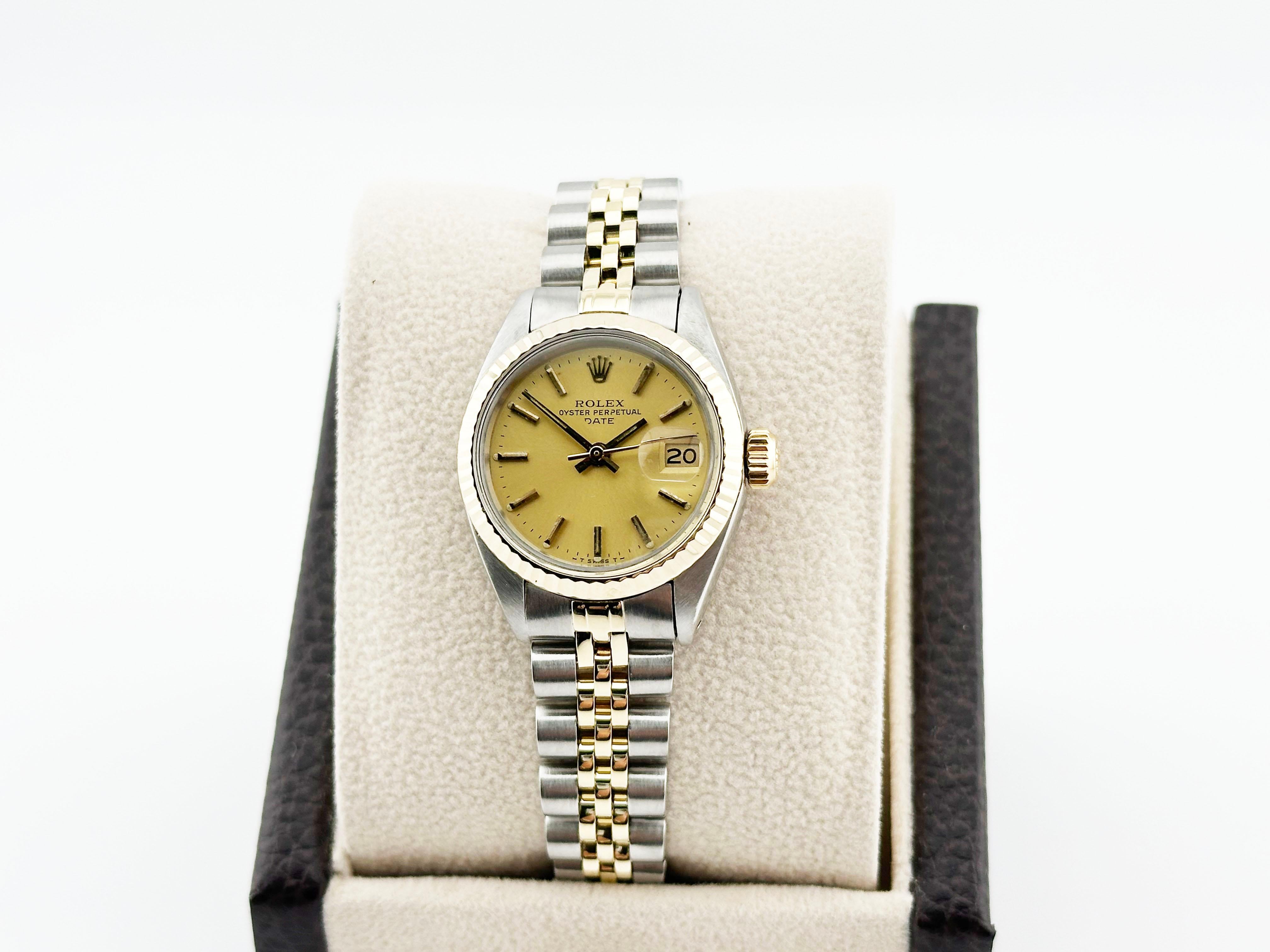 Rolex Ladies Date 6917 Champagne Dial 18K Yellow Gold Stainless Steel 26mm In Excellent Condition In San Diego, CA
