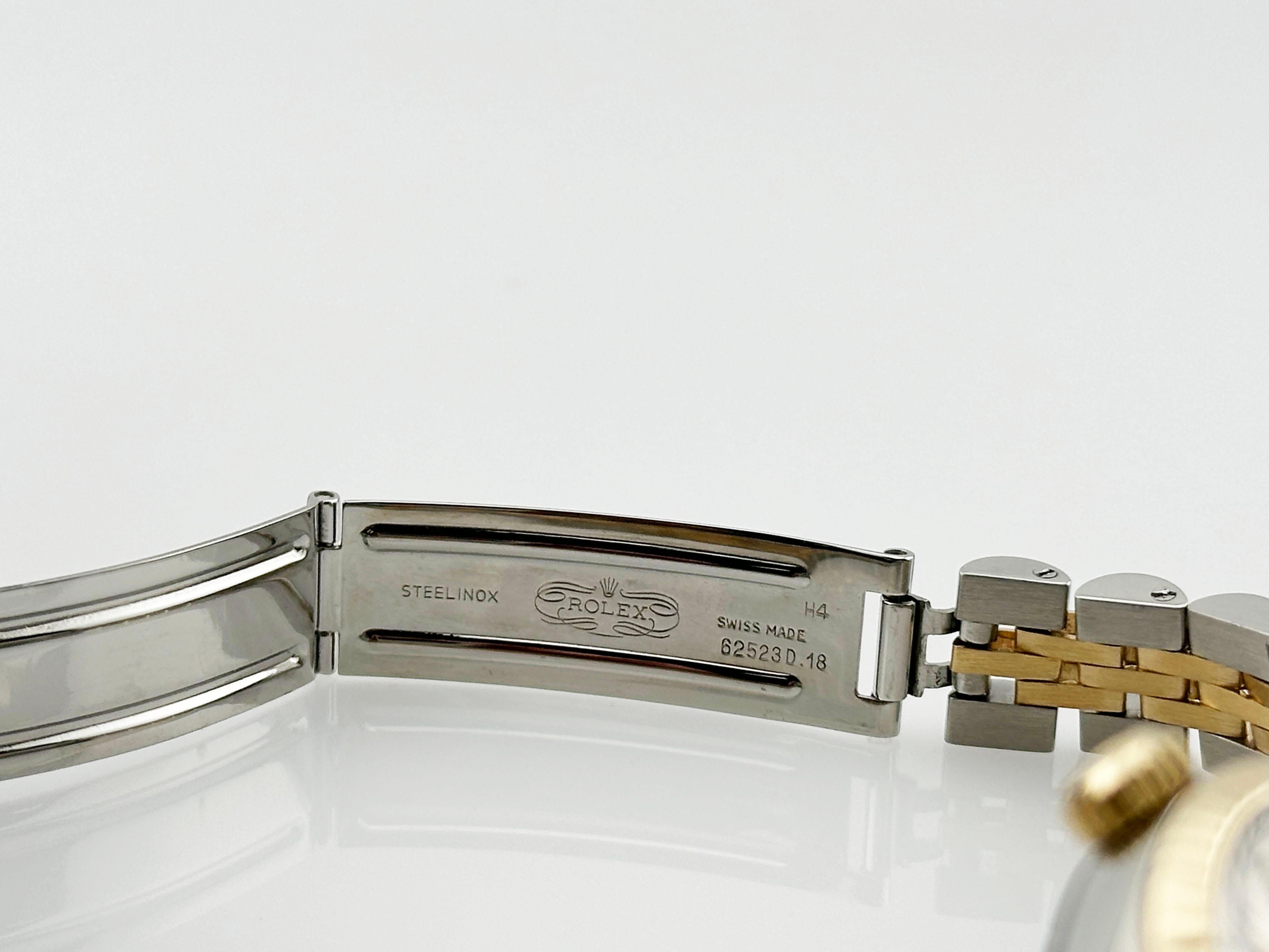 Rolex Montre pour femmes Date 6917 avec cadran argenté, or jaune 18 carats et bracelet jubilé 26 mm en vente 3