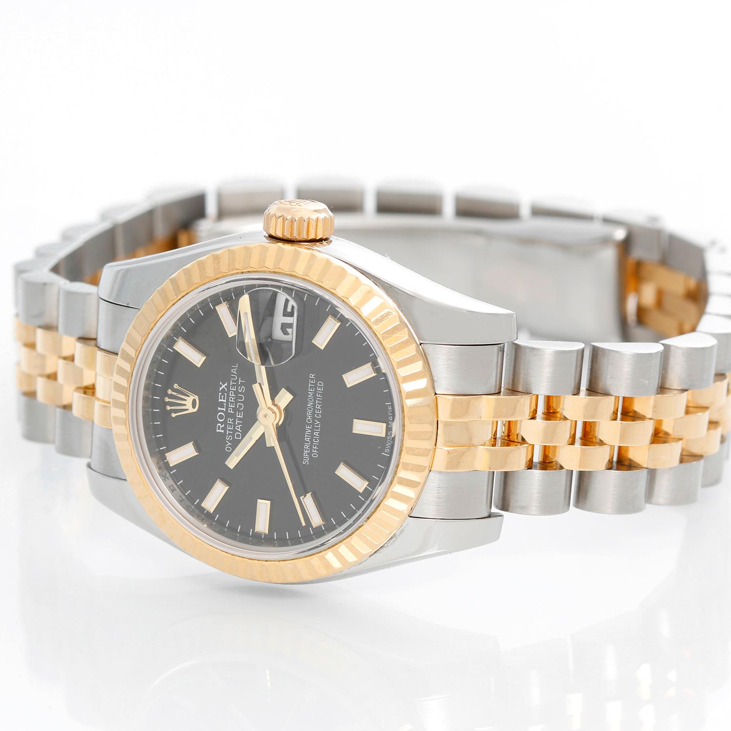 Rolex Ladies Datejust 2-Tone Jubilee Watch 179173 - Automatic winding, Quickset, 31 jewels, sapphire crystal. Stainless steel case with 18k yellow gold fluted bezel . Black dial with raised luminous hour markers . Stainless steel and 18k yellow gold